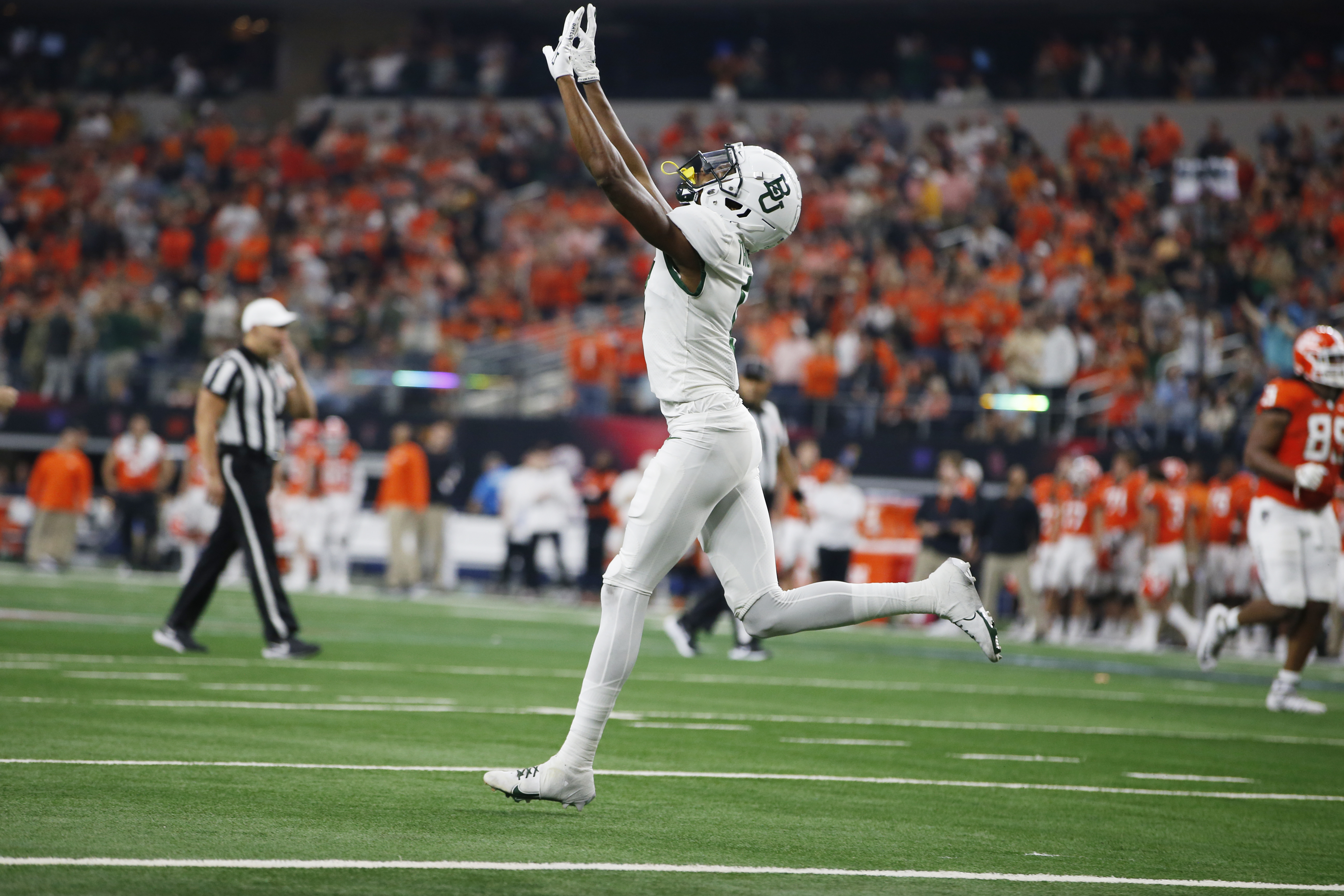 Baylor running back Trestan Ebner (1) leaps into the end zone