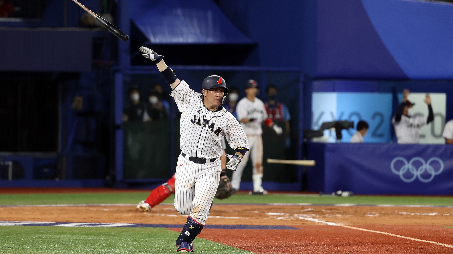 Olympics-Baseball-South Koreans strike in extra inning for