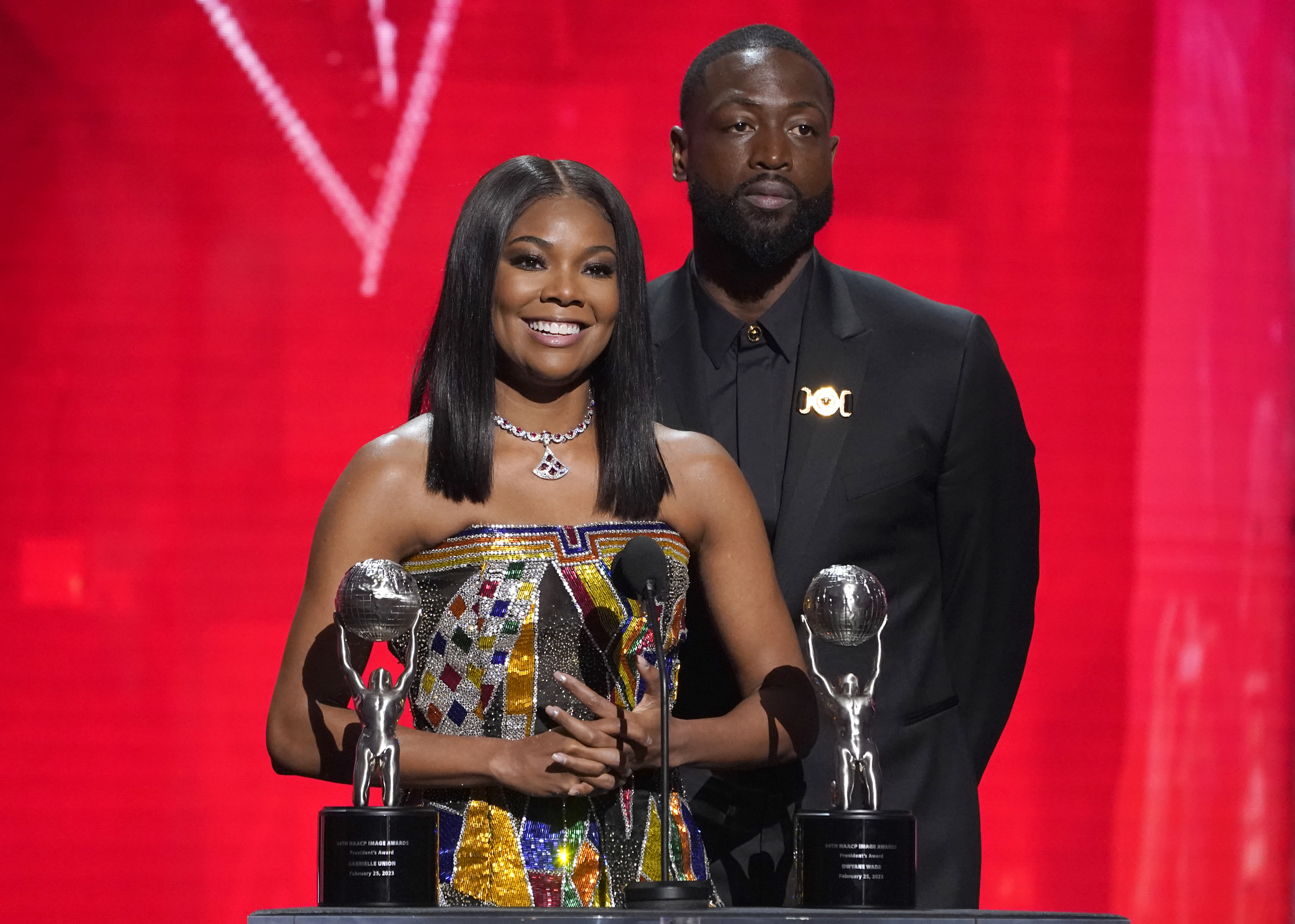 Gabrielle Union Poses With Dwyane Wade In Yellow Short Shorts On