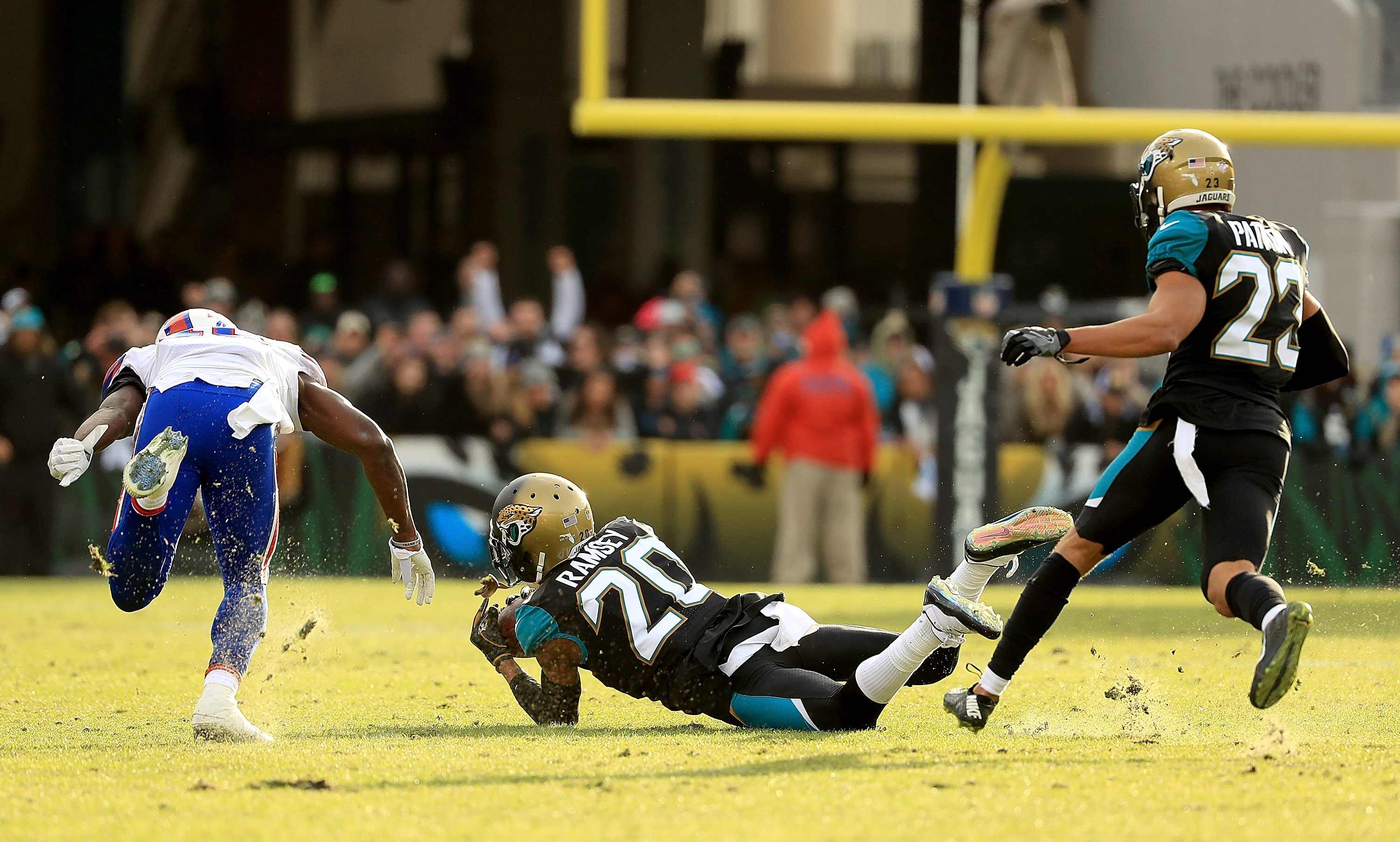 Running back Natrone Means of the Jacksonville Jaguars is hit hard by  News Photo - Getty Images