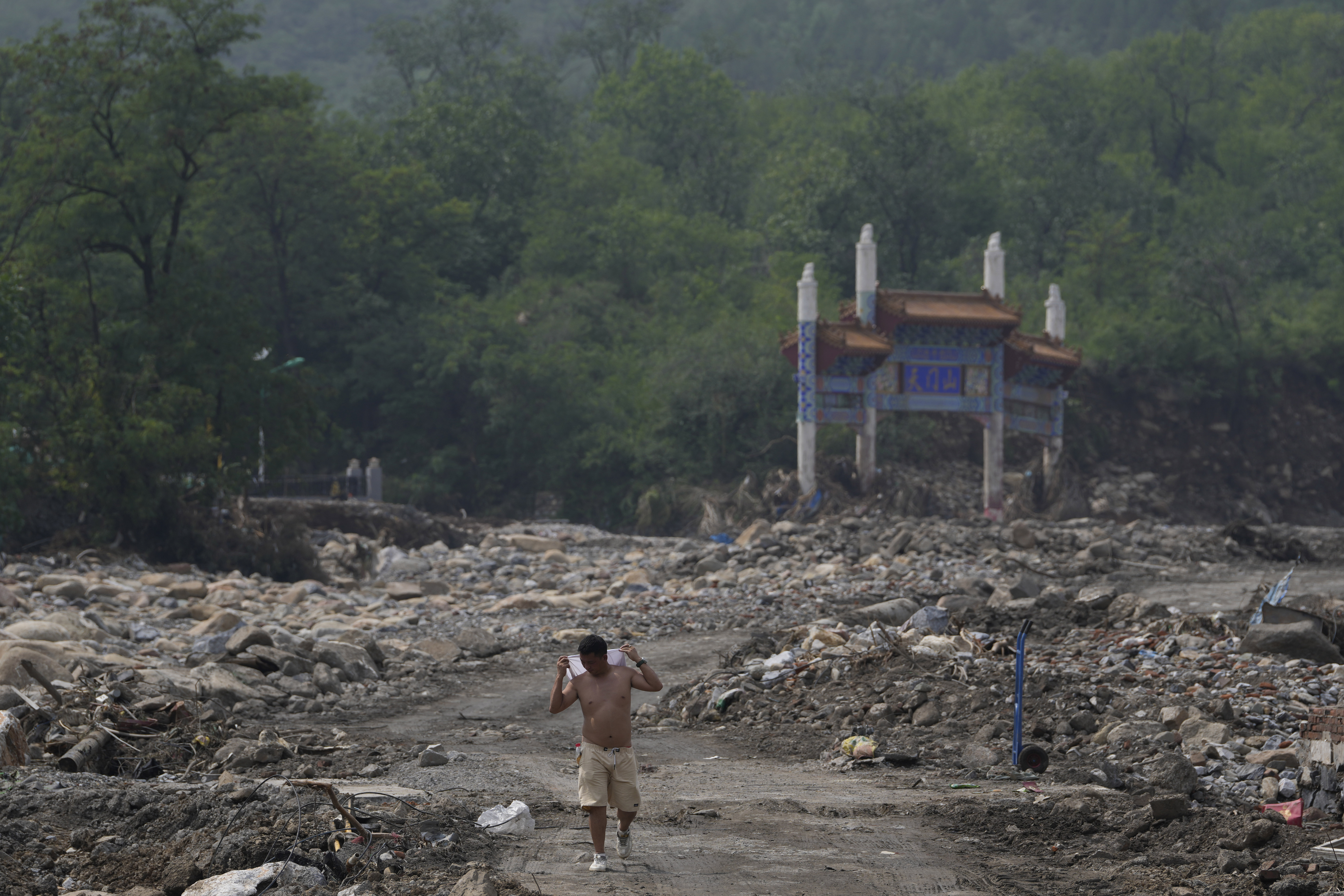 Deadly flooding in China worsens as rescues and evacuations intensify