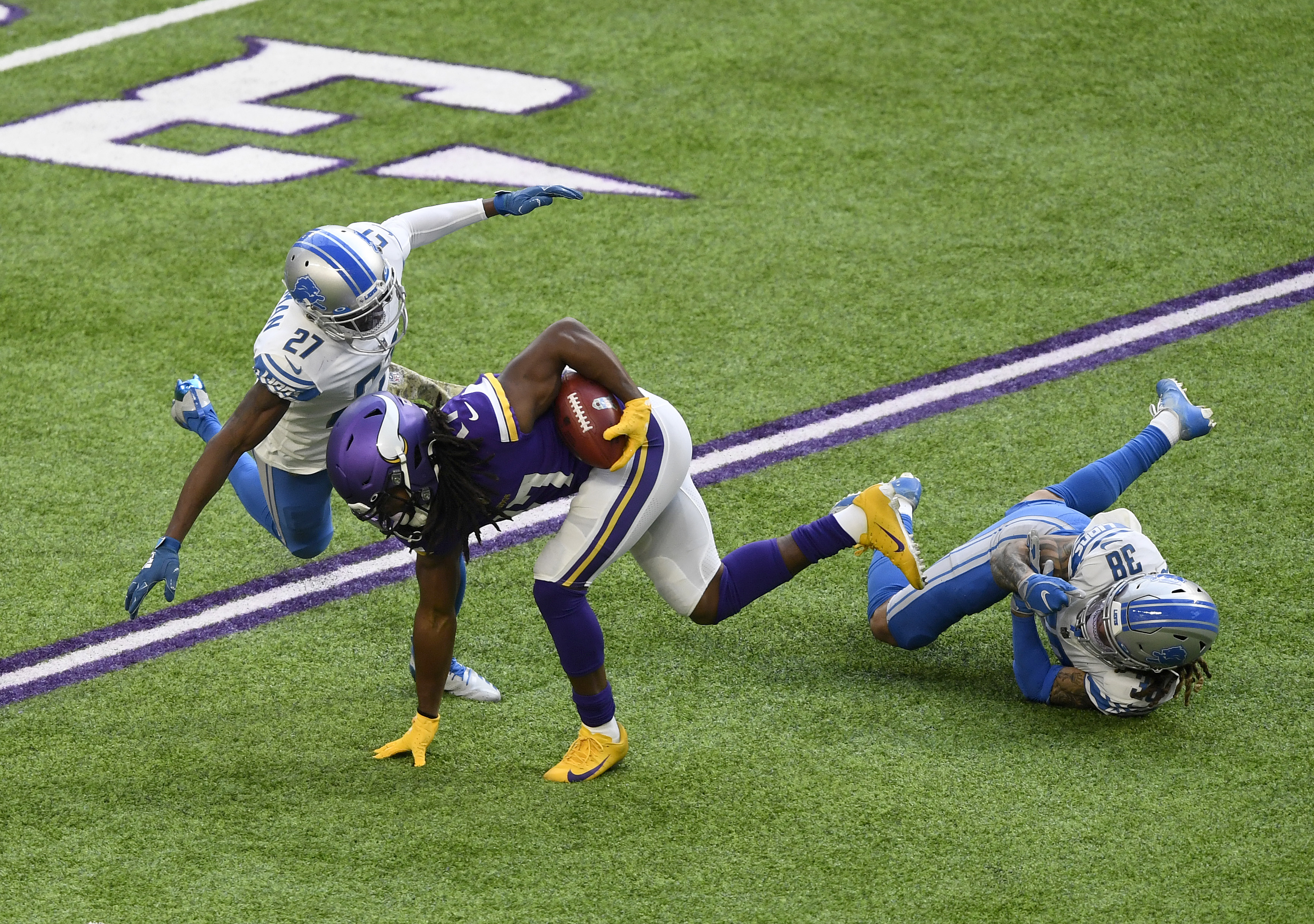 Detroit Lions defensive back Mike Ford (38) plays against the