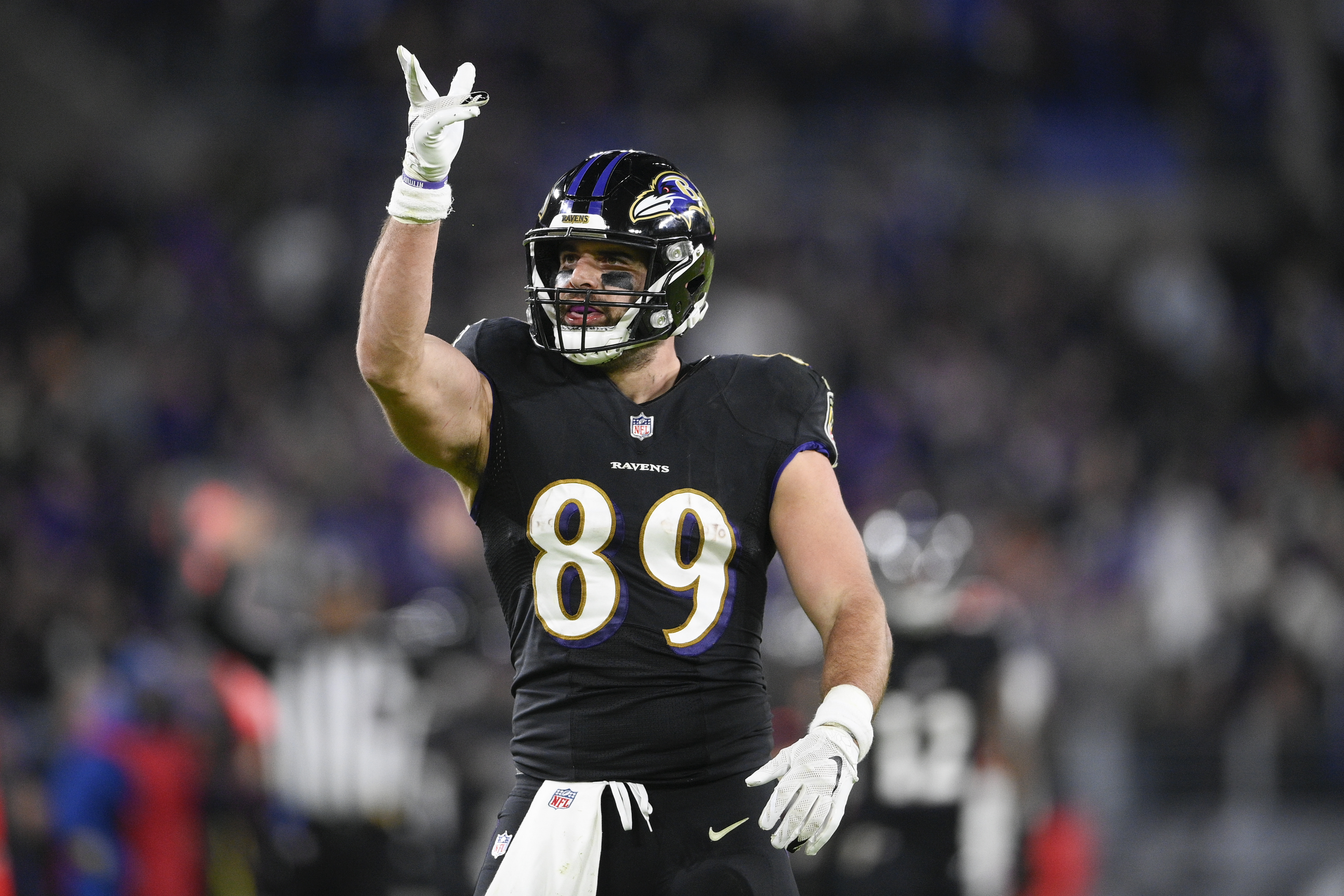 Baltimore Ravens tight end Mark Andrews answers questions from