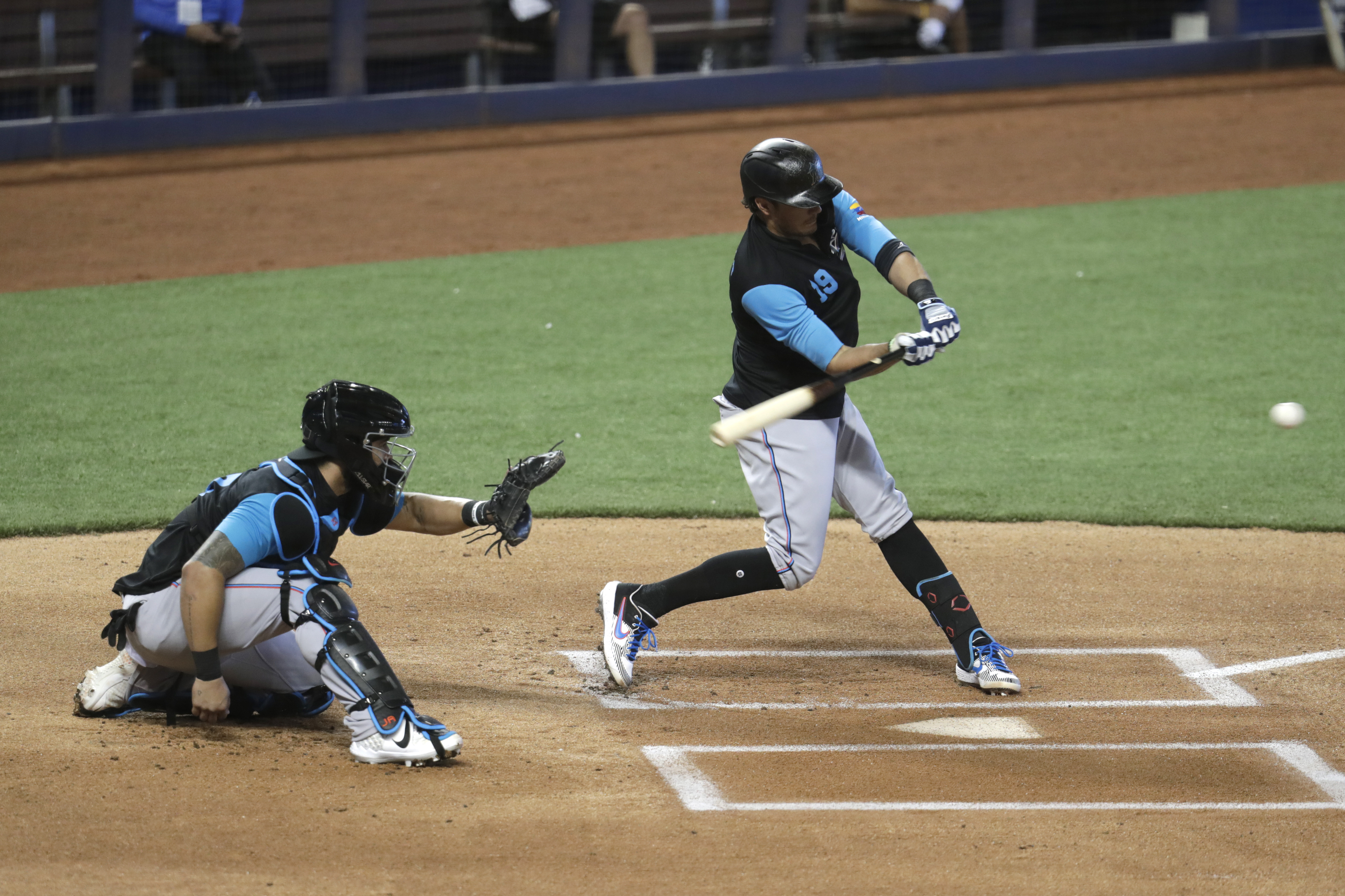 Aguilar leads Marlins over Phillies 5-2 in Girardi's debut