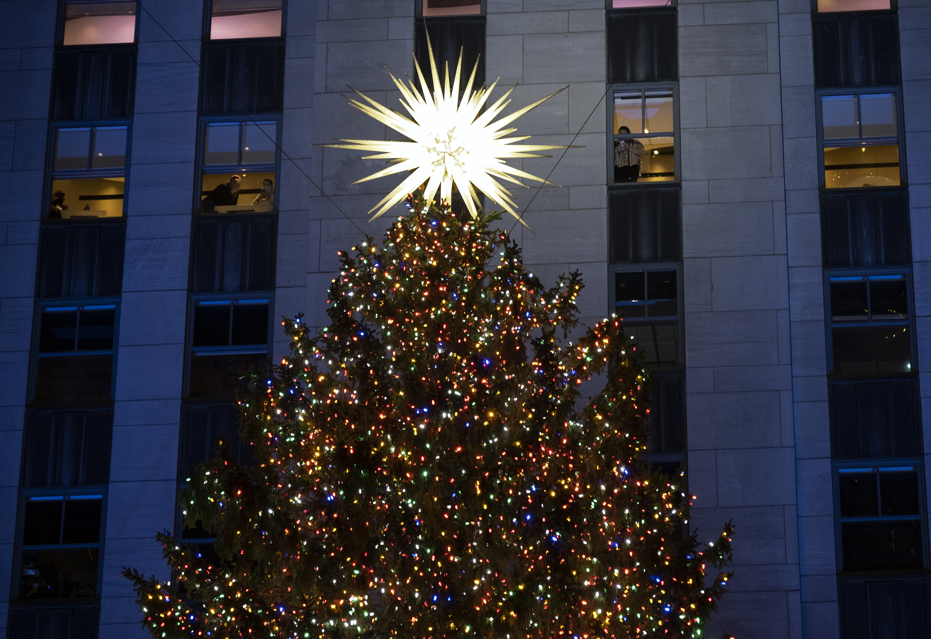 Rockefeller Center Christmas Tree turns on, with virus rules - The Boston  Globe