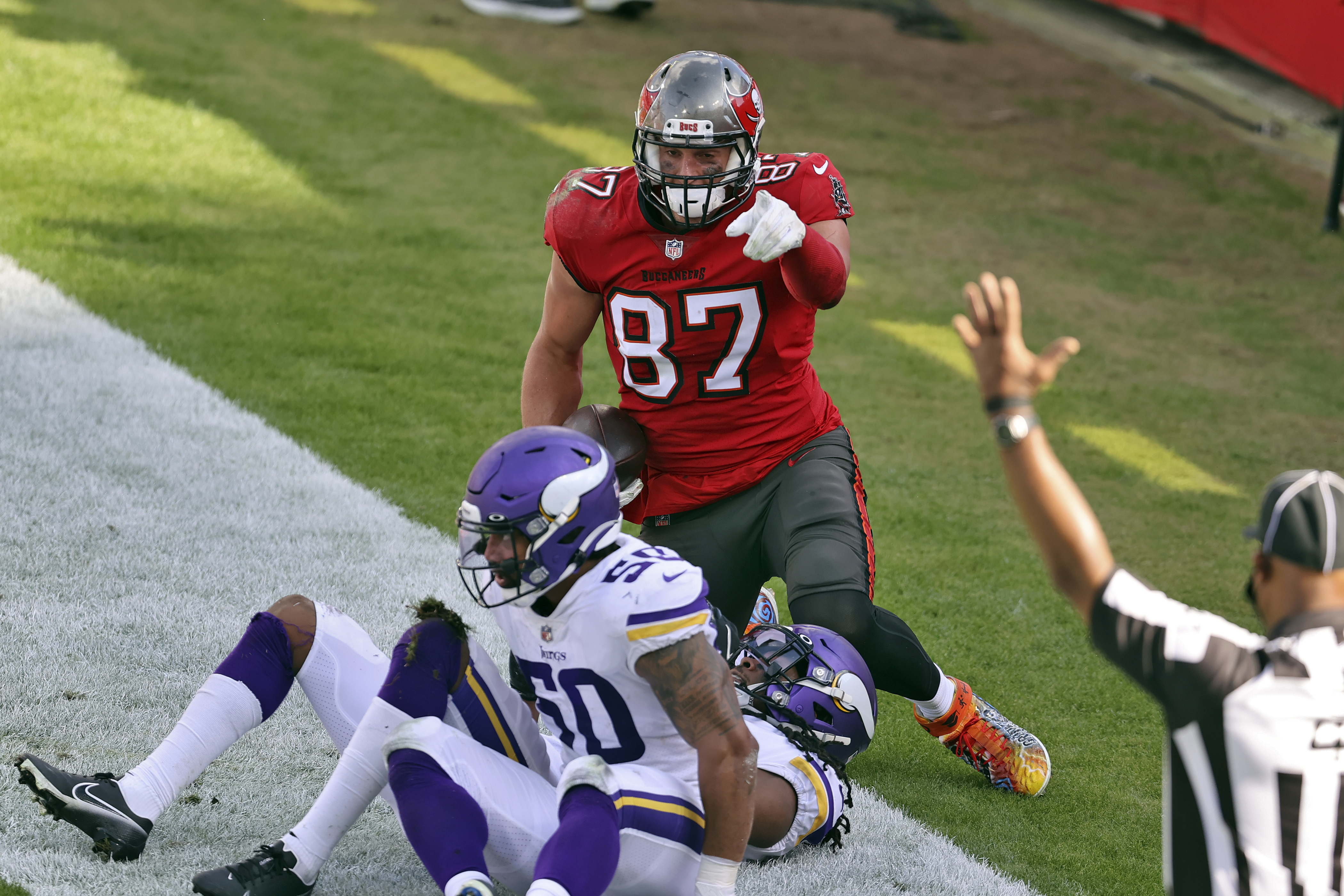 Minnesota Vikings fullback C.J. Ham (30) celebrates after his touchdown  with offensive tackle Brian O'Neill, right, in the second half of an NFL  football game against the Buffalo Bills, Sunday, Nov. 13