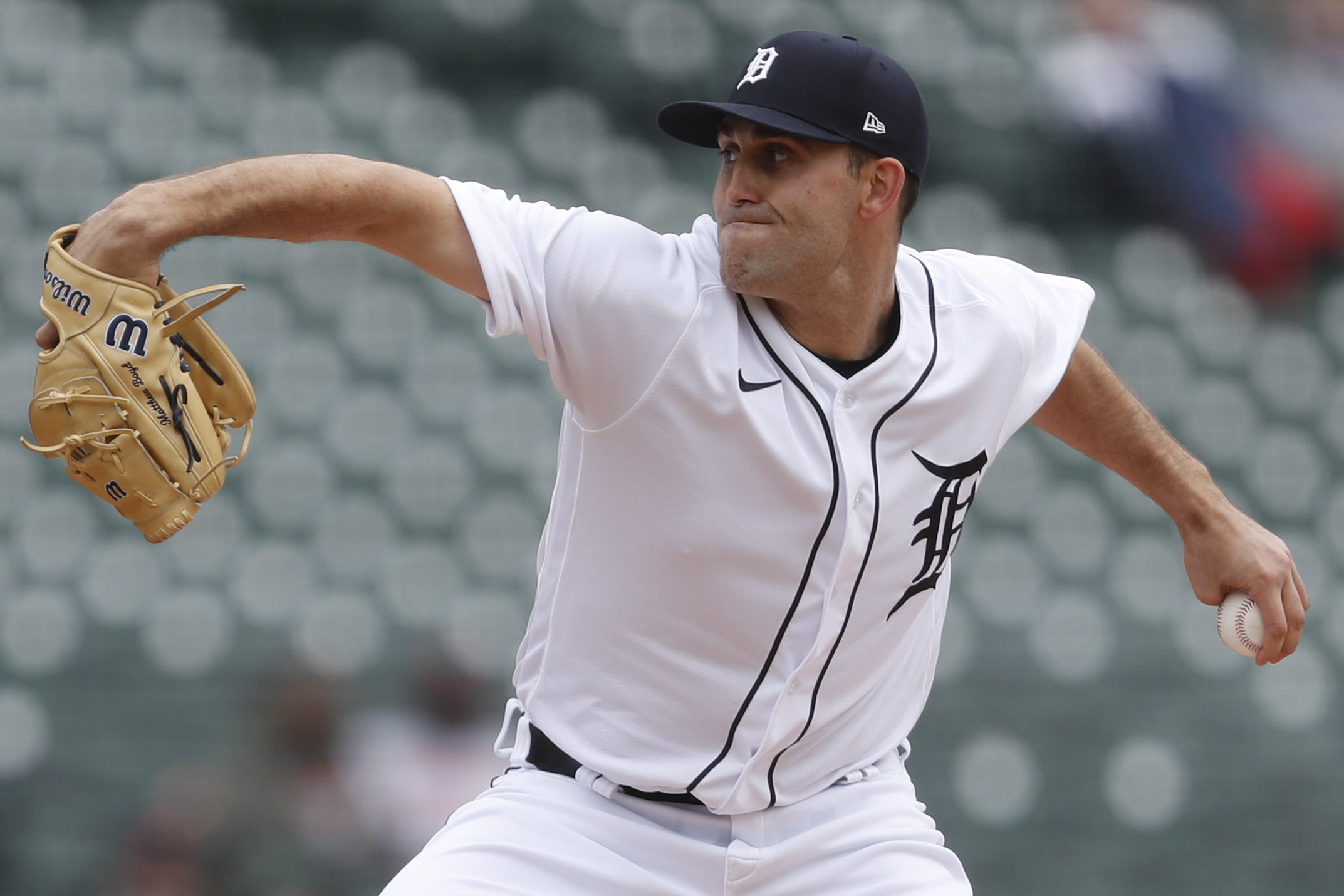 Detroit Tigers starting pitcher Matthew Boyd (48) stands on the mound with  teammates before leaving during the first inning of a baseball game against  the Texas Rangers in Arlington, Texas, Monday, June