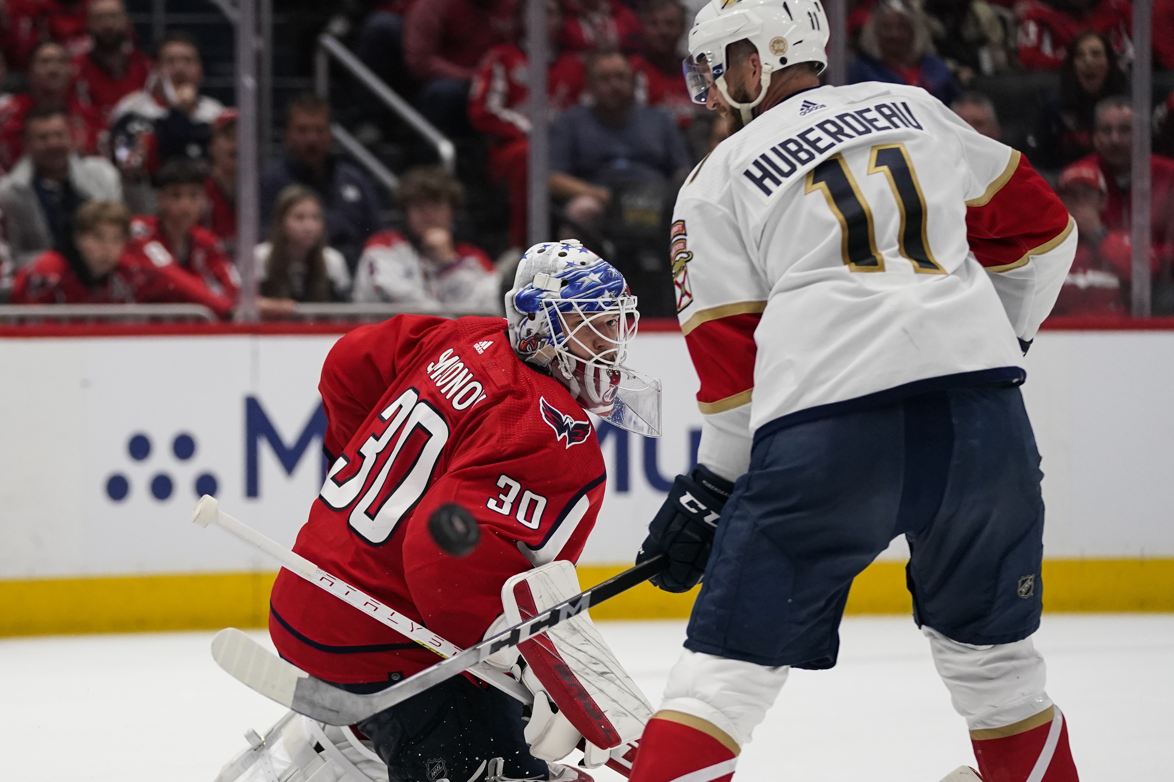 Florida Panthers center Aleksander Barkov (16) and Washington Capitals left  wing Alex Ovechkin (8) react after Game 6 in the first round of the NHL  Stanley Cup hockey playoffs, Friday, May 13