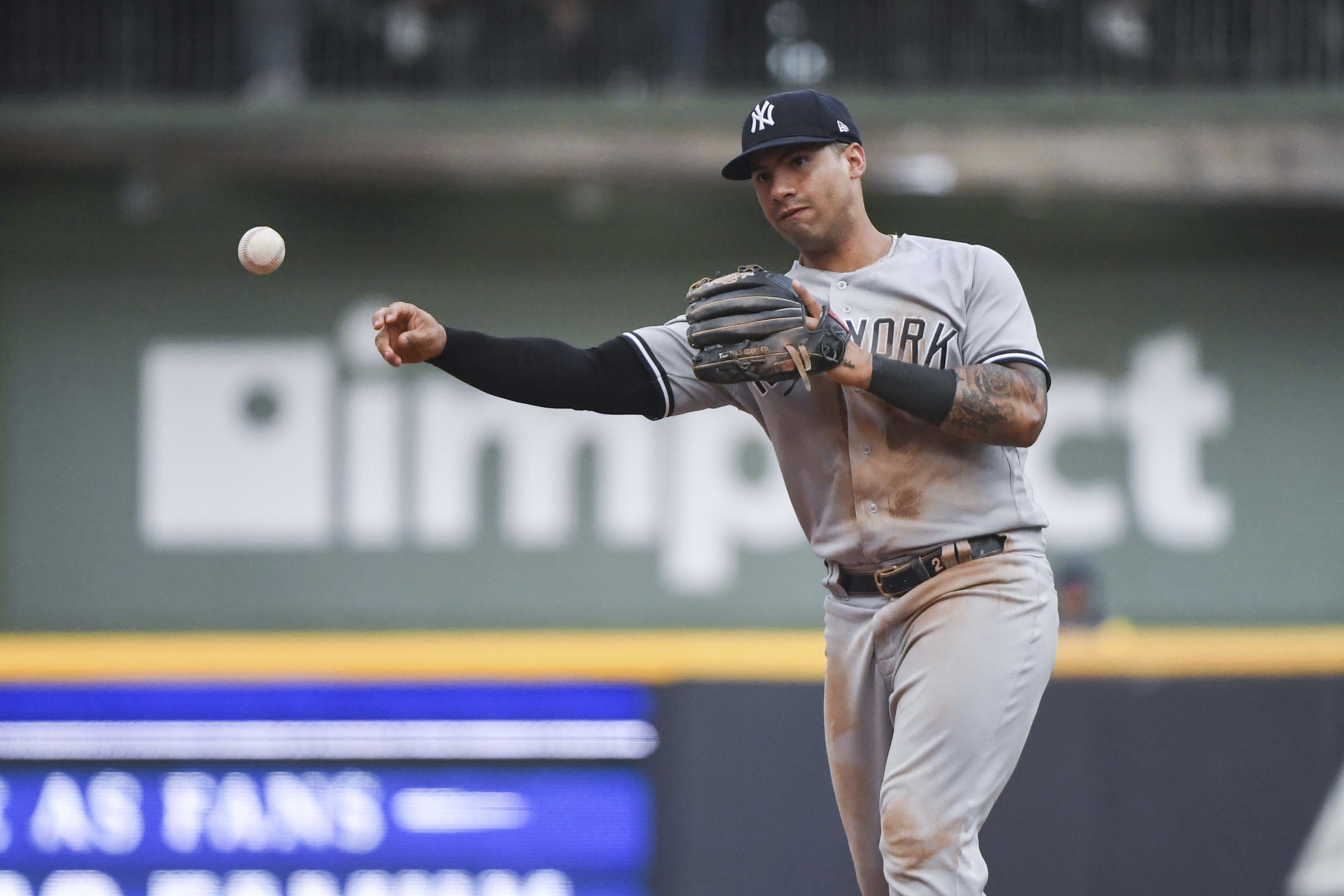 New York Yankees' Aaron Judge talks with Milwaukee Brewers' Rowdy