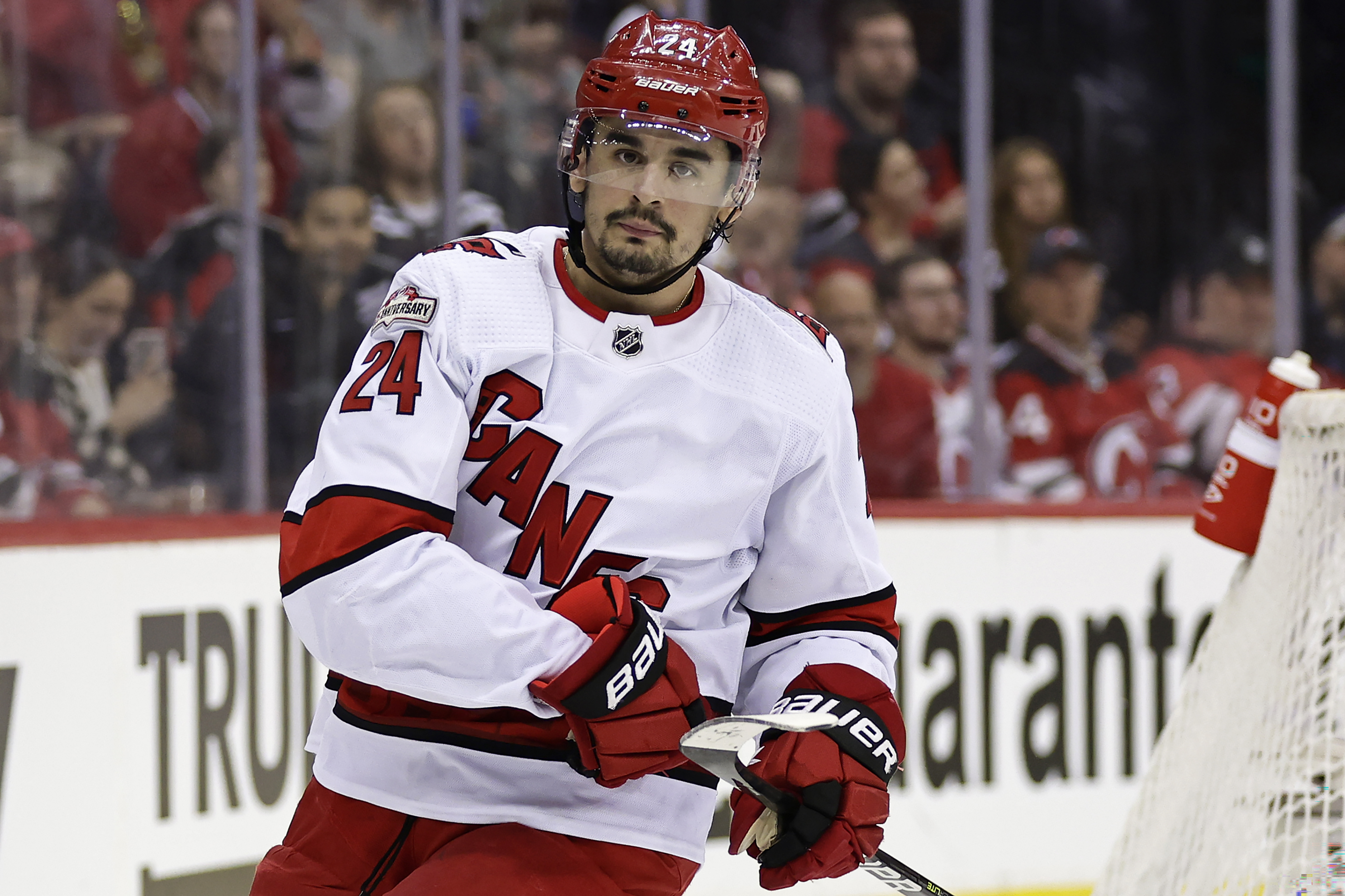 New Jersey Devils' Ondrej Palat (18) checks Carolina Hurricanes