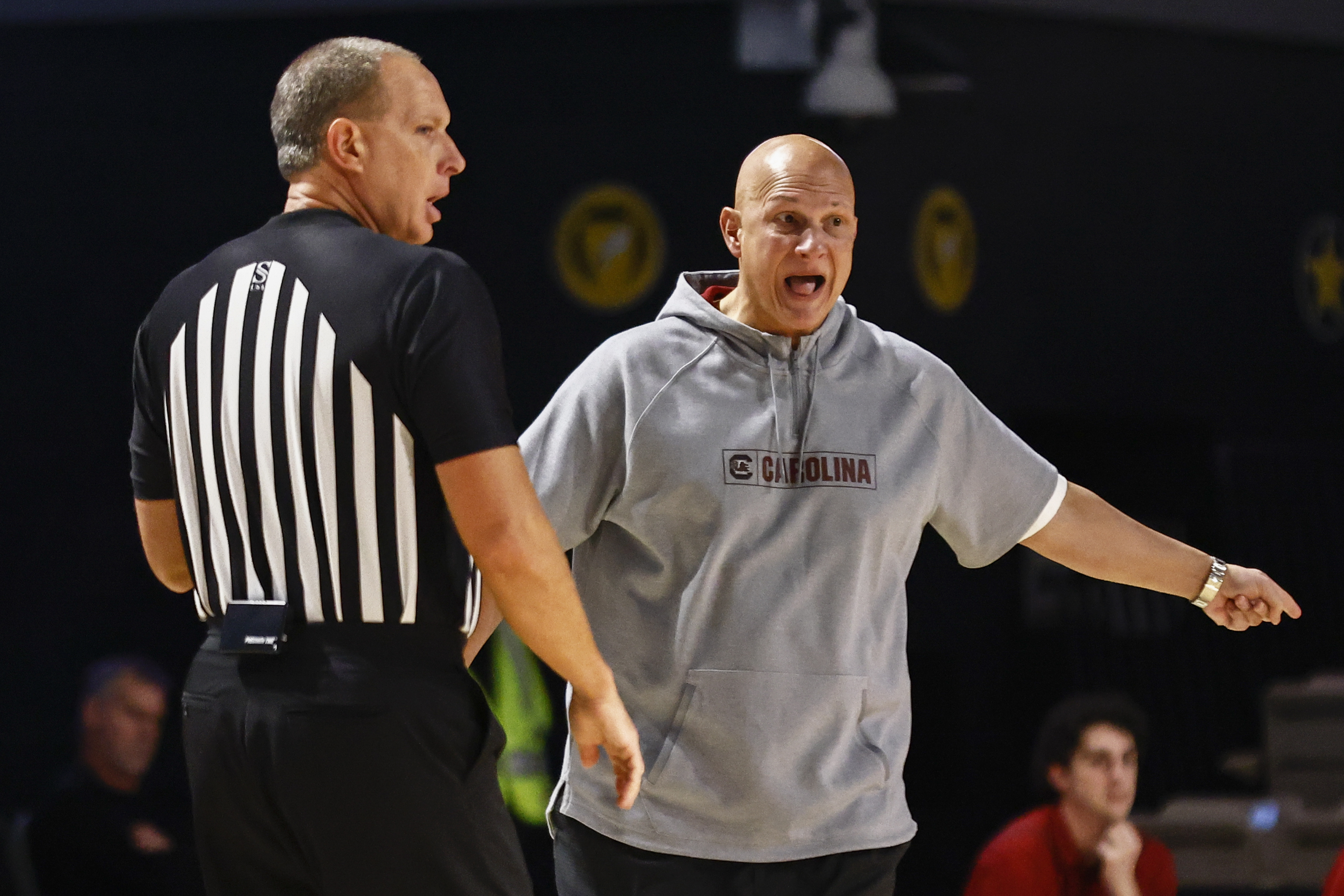 NCAA hoops leagues grapple with unequal pay for women's refs