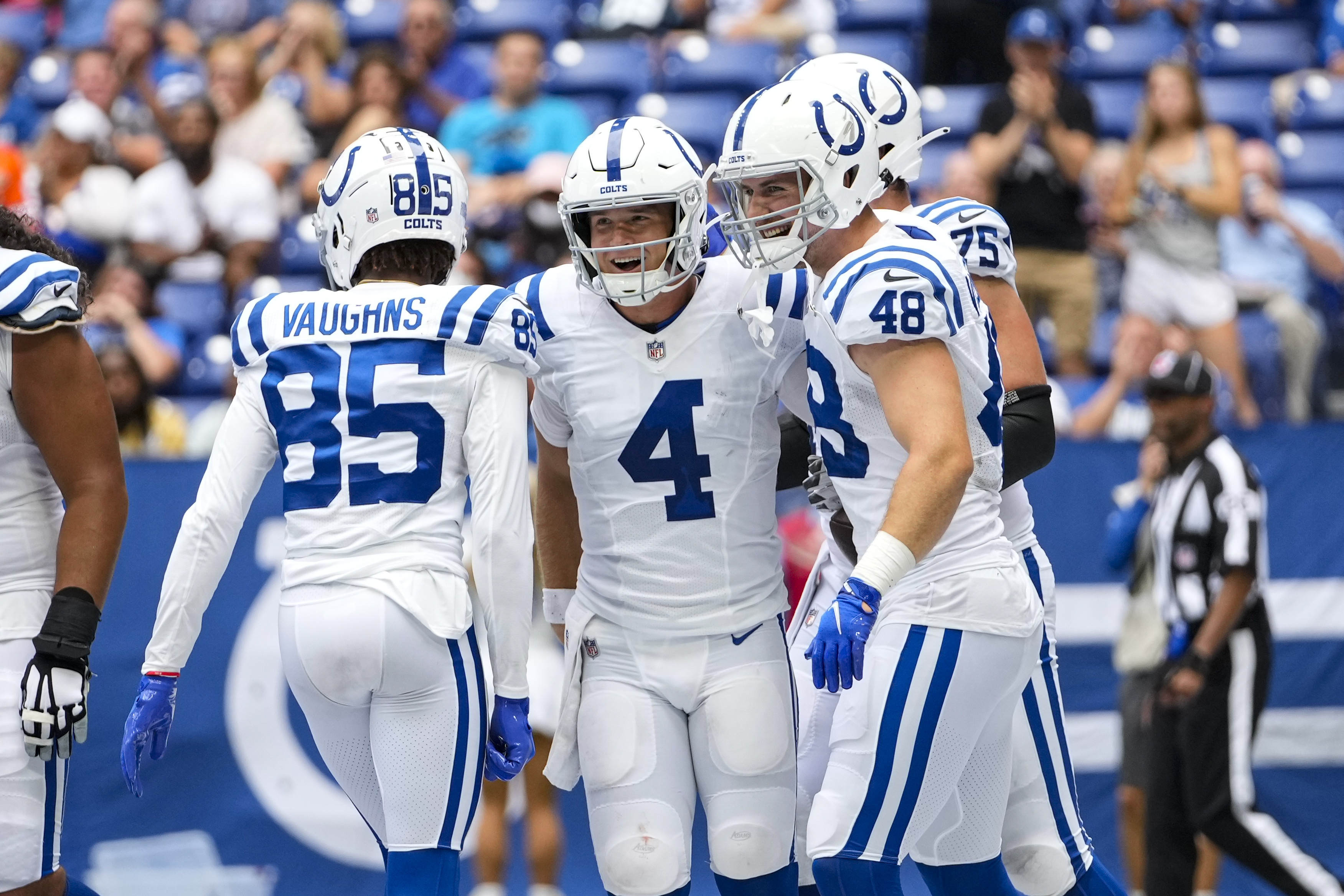 Detroit Lions offense huddles against Indianapolis Colts during an NFL  preseason football game, …