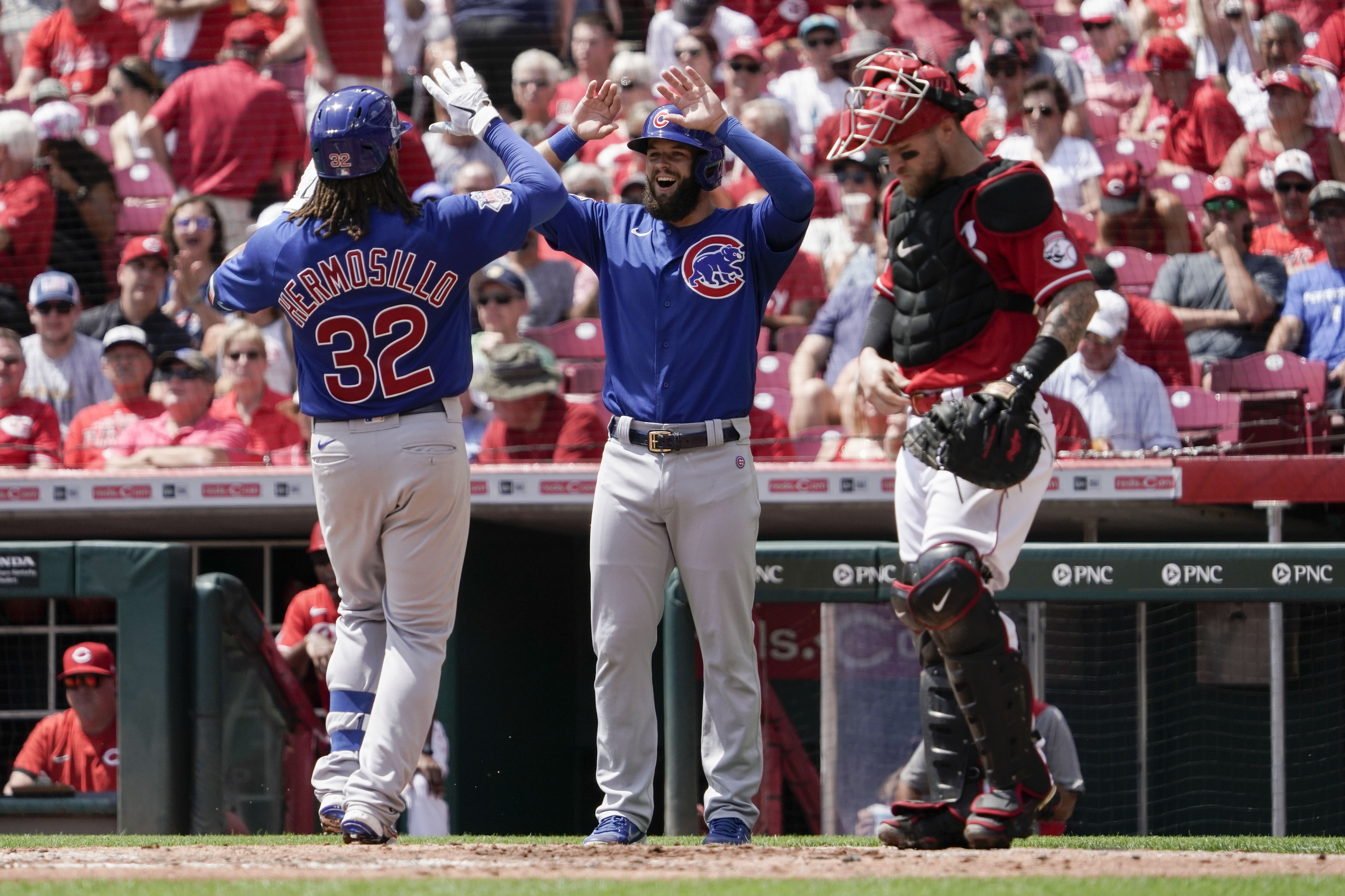 Depleted Cubs quiet playoff-contending Reds again, win 7-1