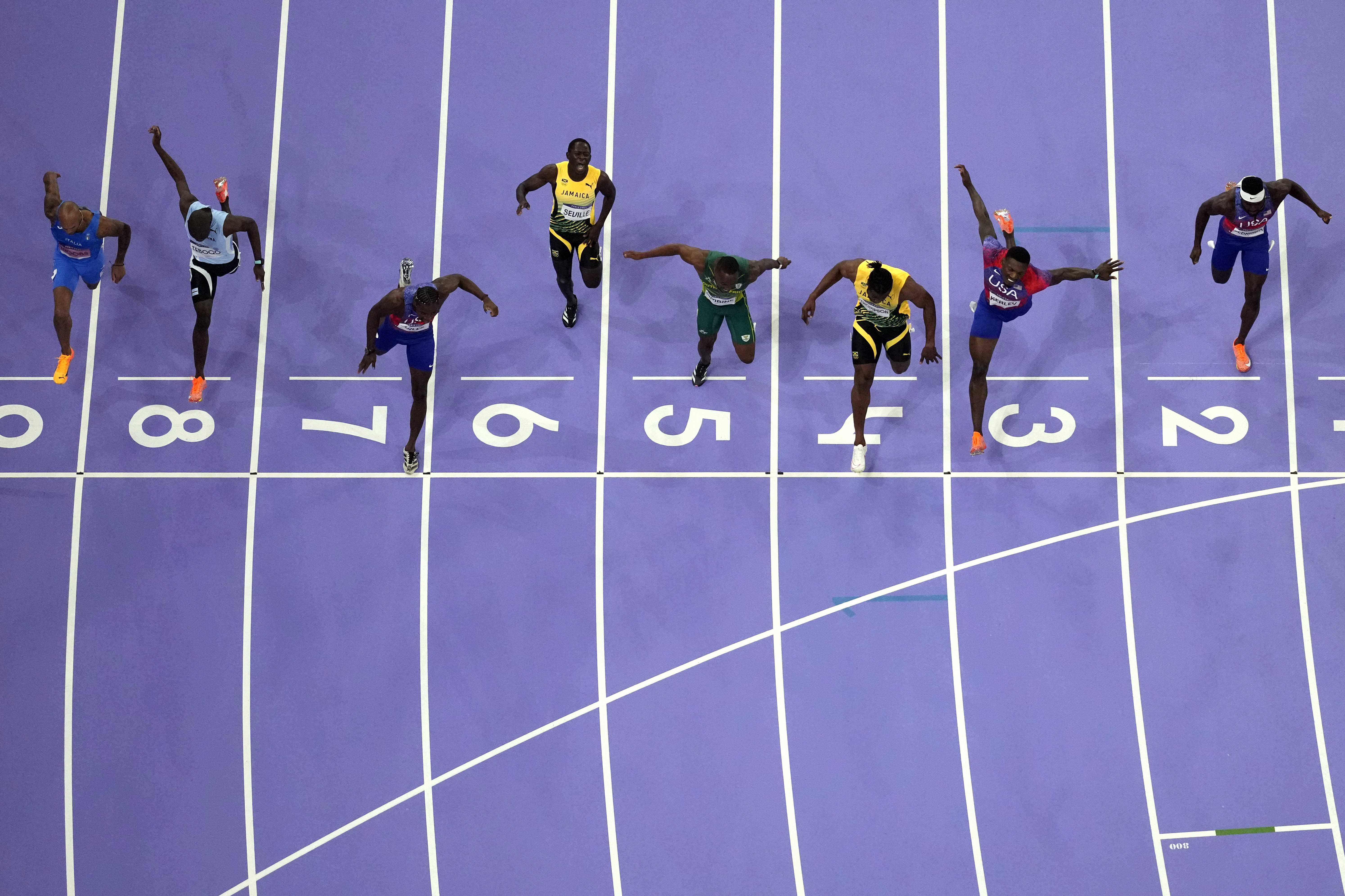 Noah Lyles wins a historically close Olympic 100-meter sprint by