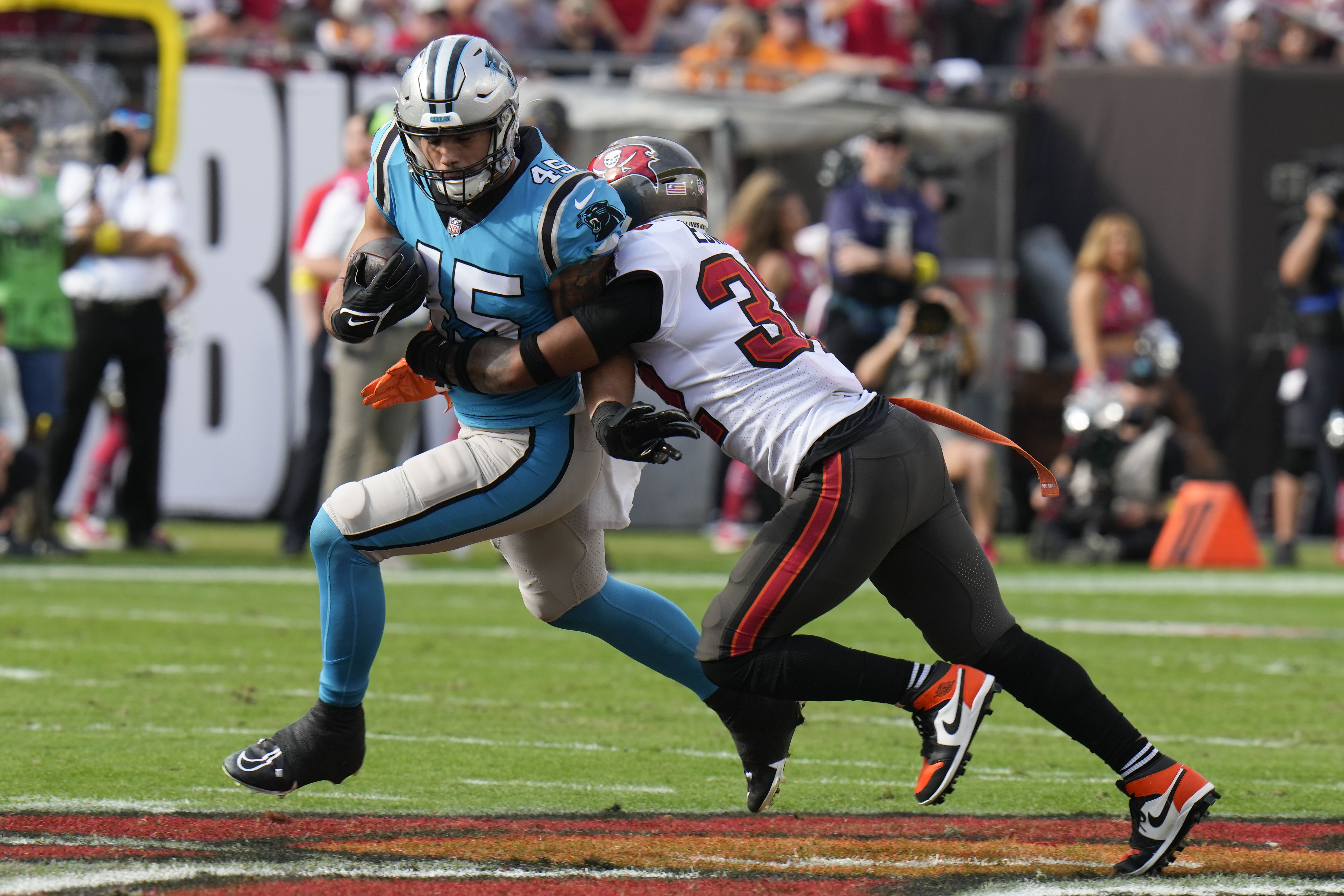 Brady, Bucs rally to beat Panthers 30-24, clinch NFC South