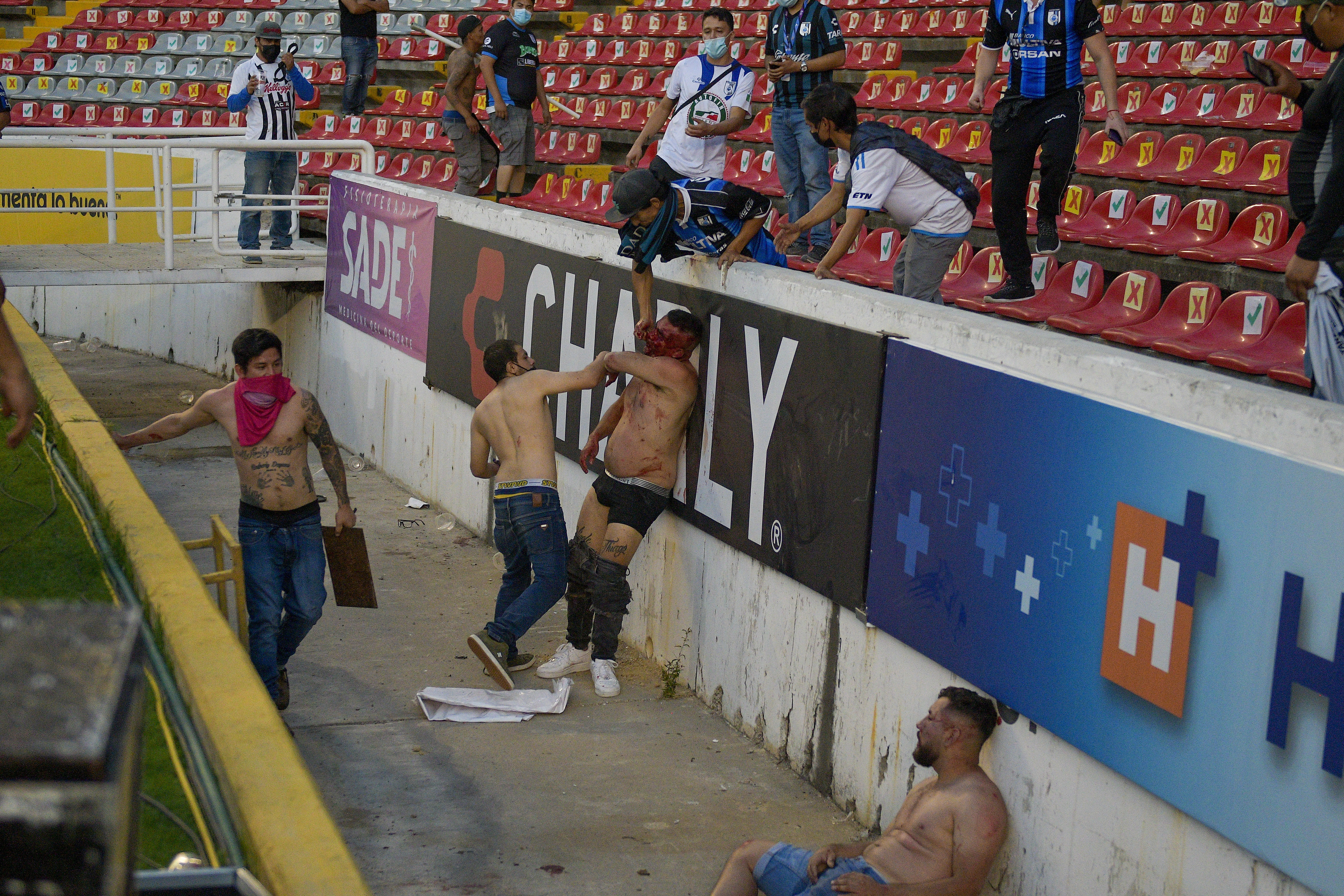 Mexican soccer game brawl: At least 26 injured as fights break out at Liga  MX game between Querétaro and Atlas fans