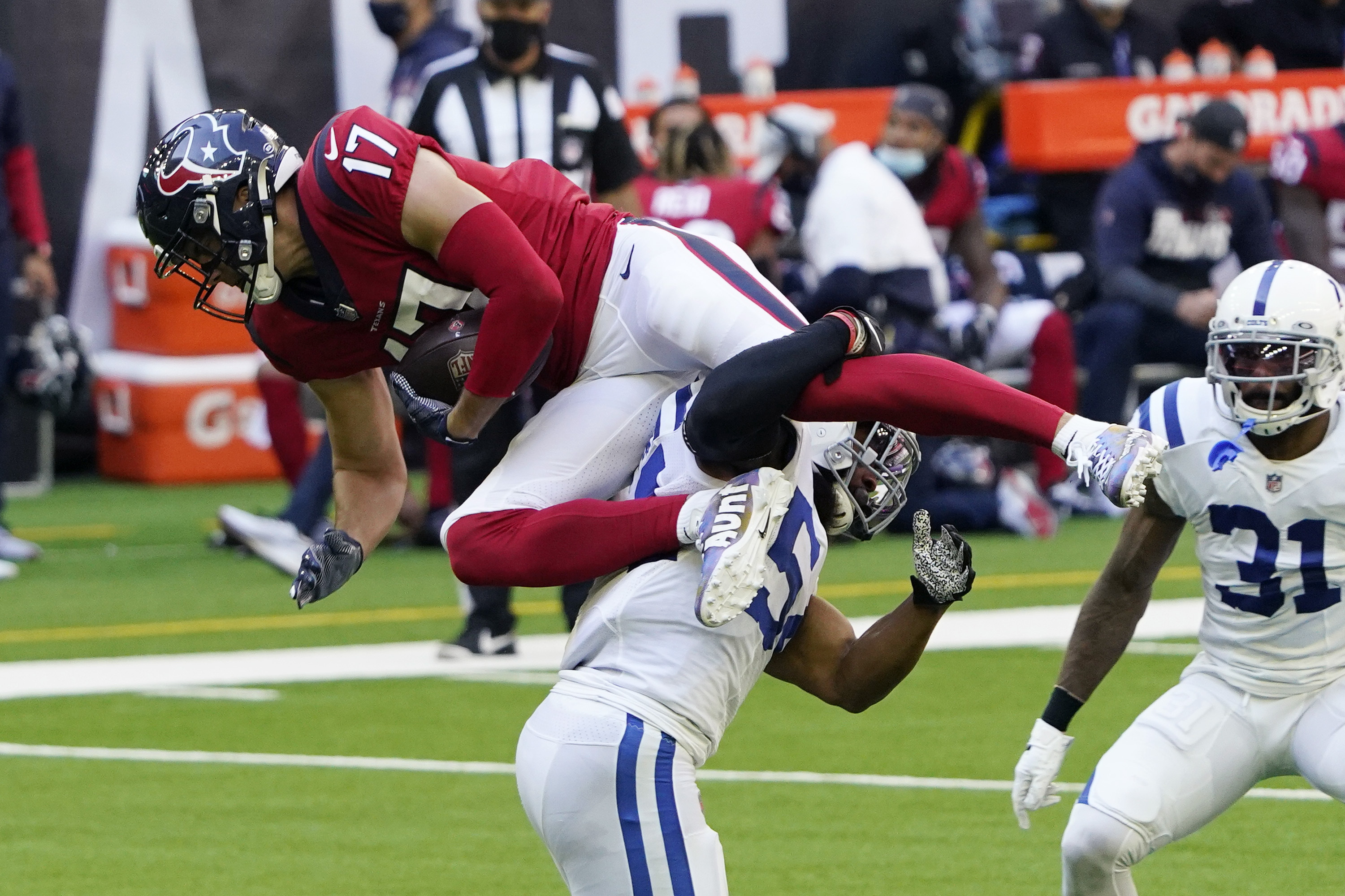 Houston Texans wide receiver Chad Hansen (17) hands the ball off