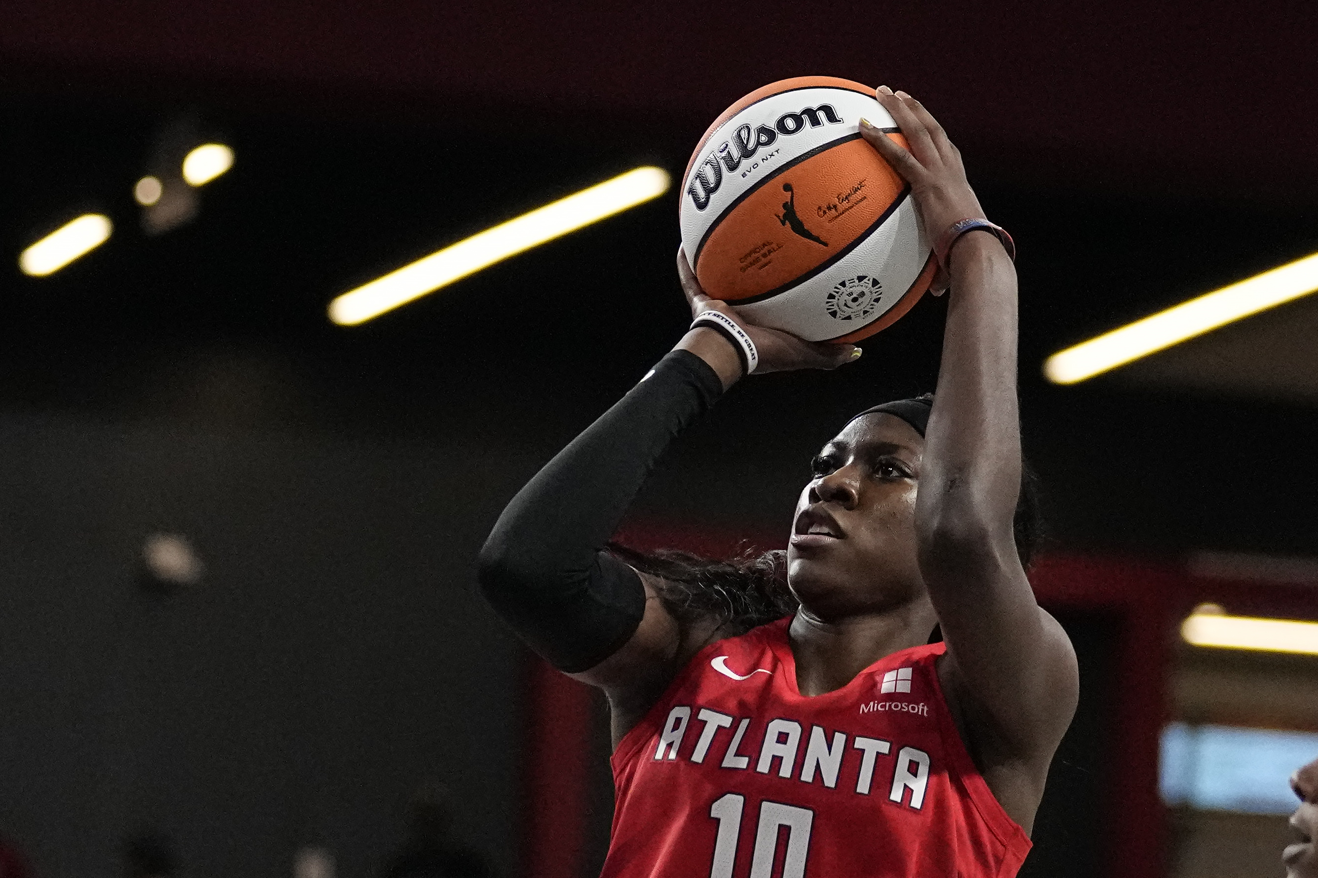 Atlanta Dream head coach Tanisha Wright works during a WNBA