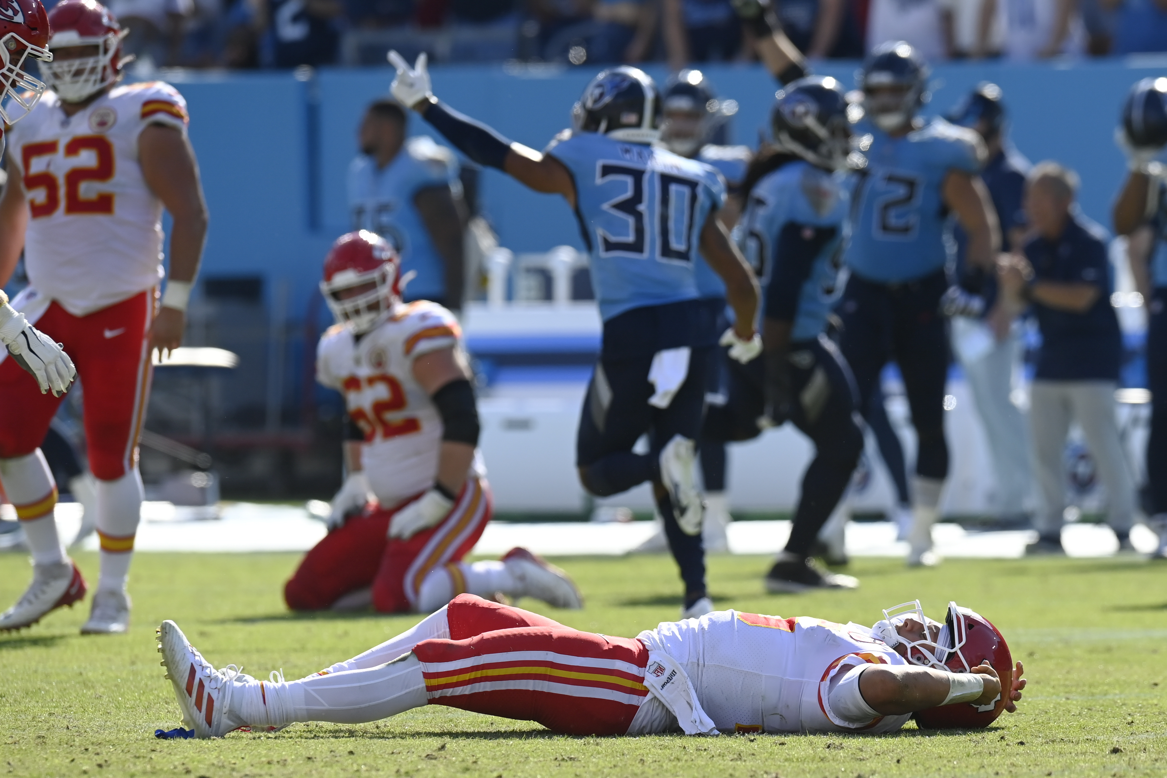 Kansas City Chiefs quarterback Patrick Mahomes (15) talks with quarterback  Chad Henne (4) on the sideline during an NFL football game against the Las  Vegas Raiders, Sunday, Nov. 14, 2021, in Las