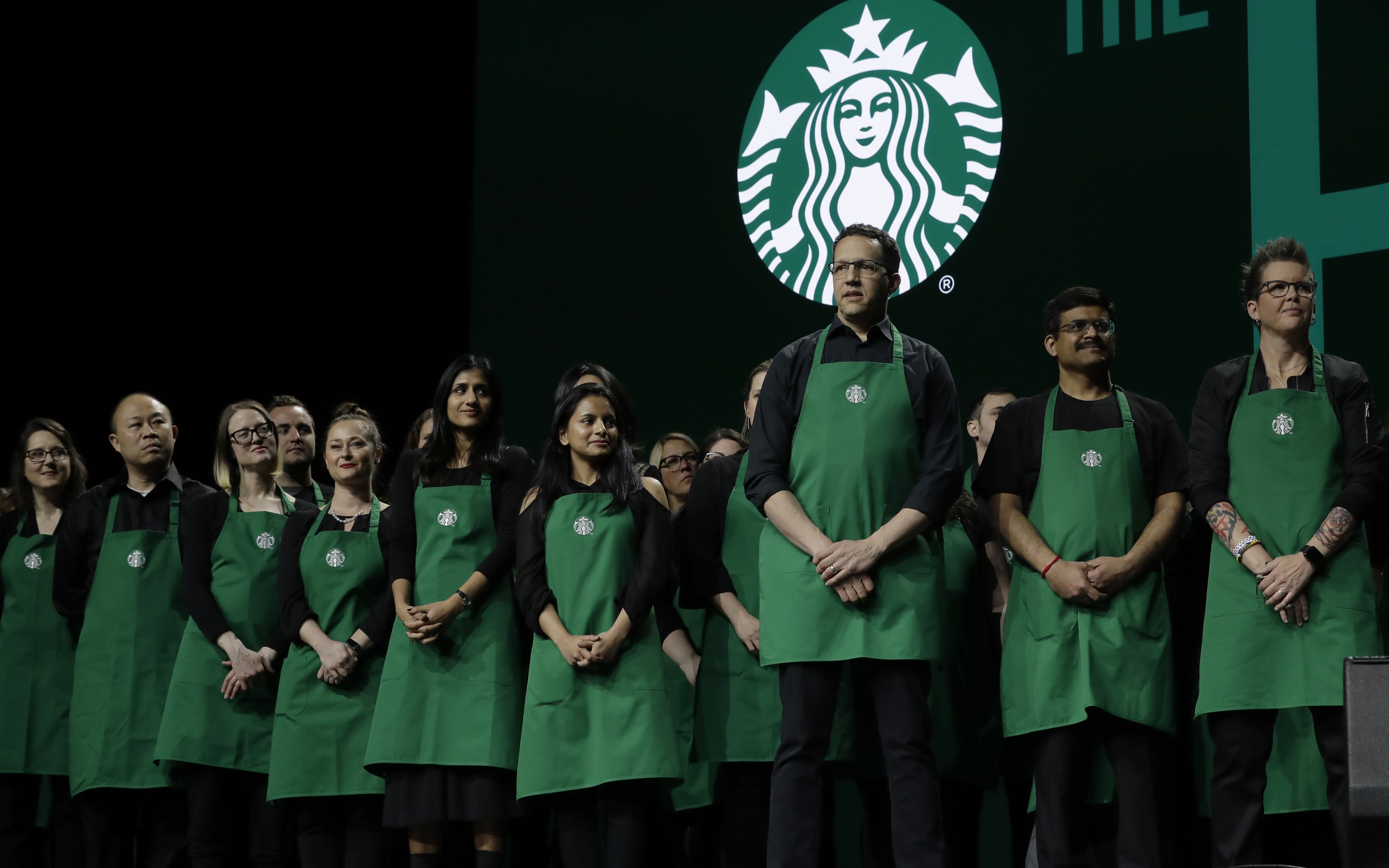 starbucks employee dress code Starbucks imposes new limits on what baristas can wear under their green  aprons