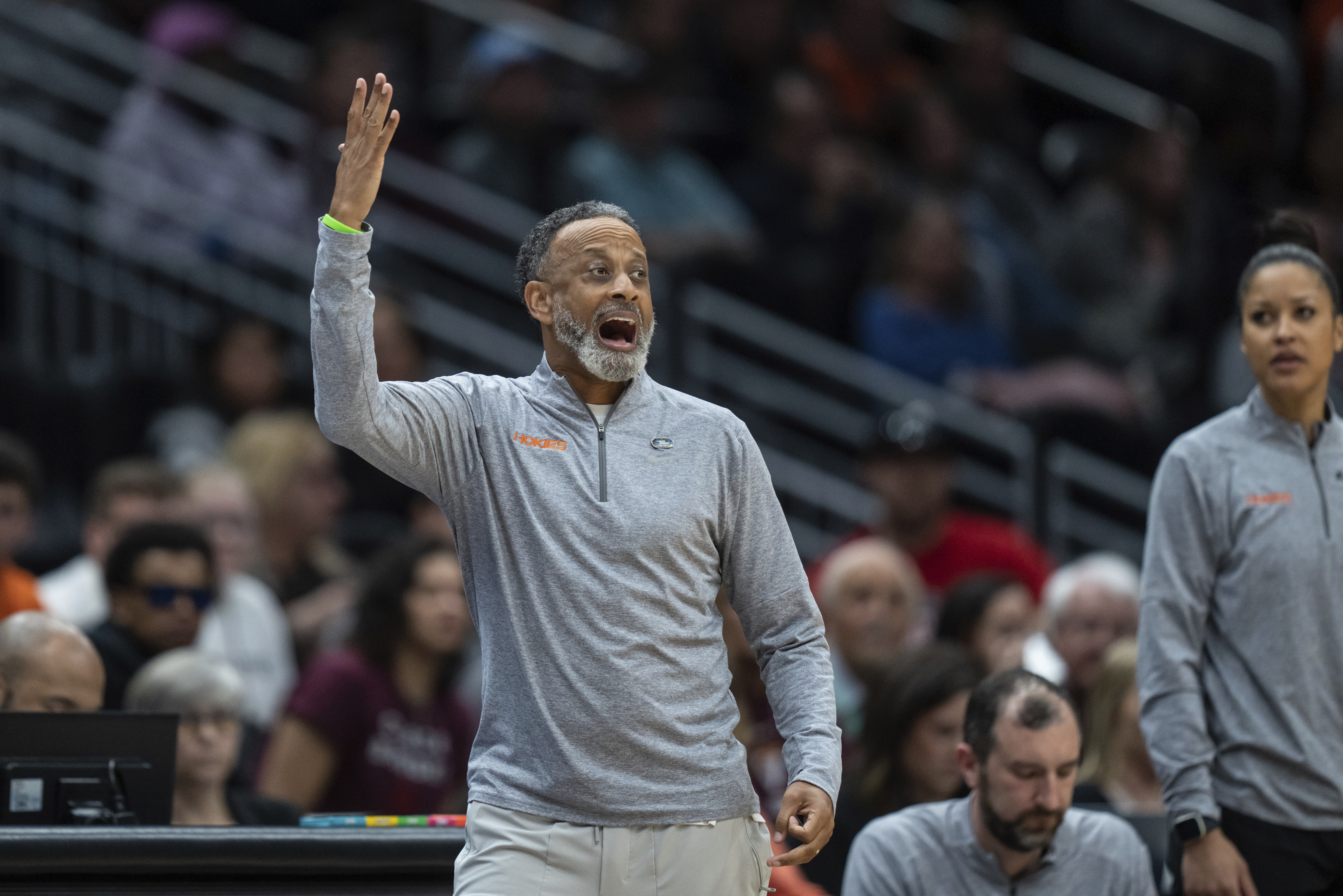 March Madness: Dawn Staley's wears a Cheyney jersey while coaching