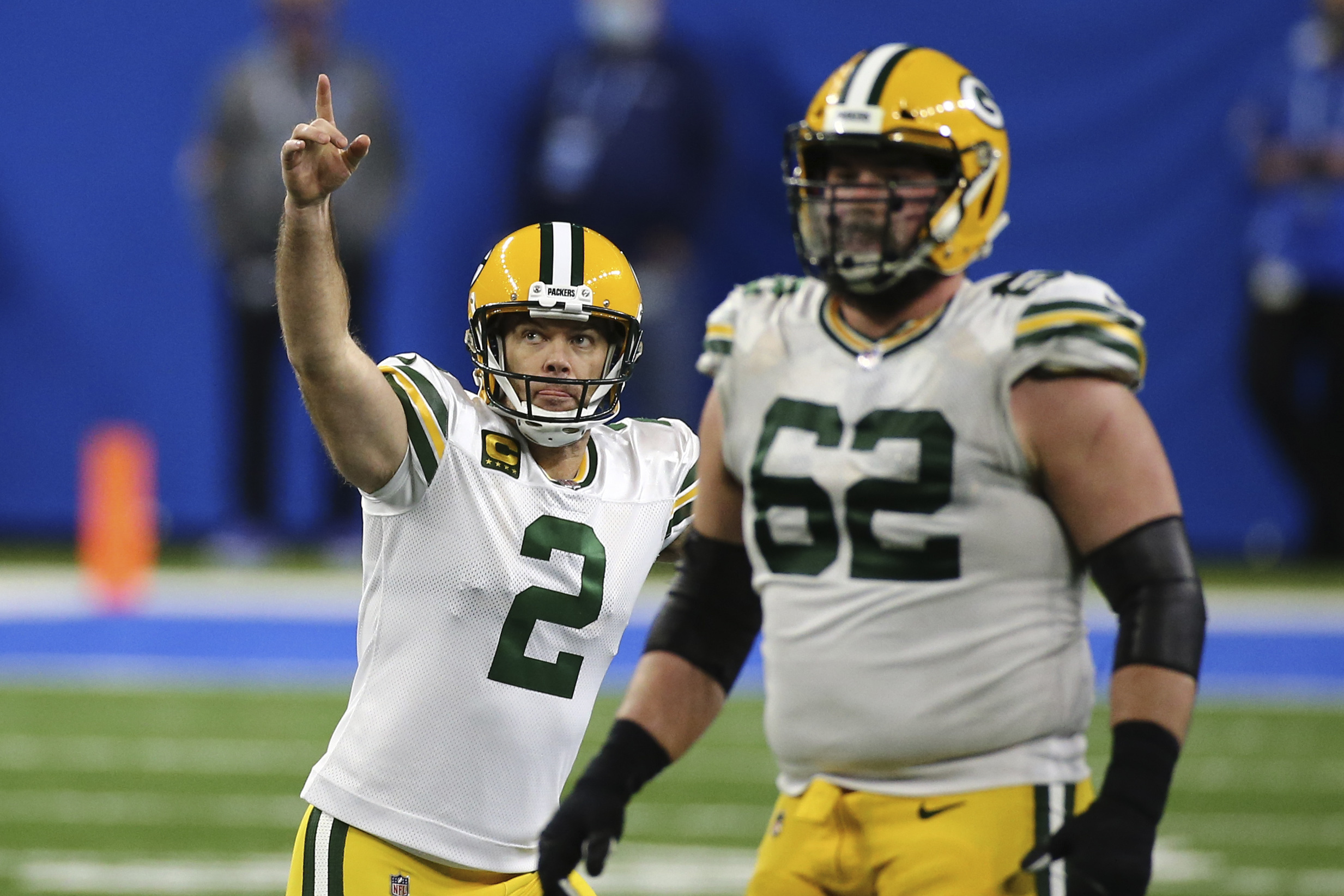 Rodgers-led Packers beat Lions 31-24 to win NFC North