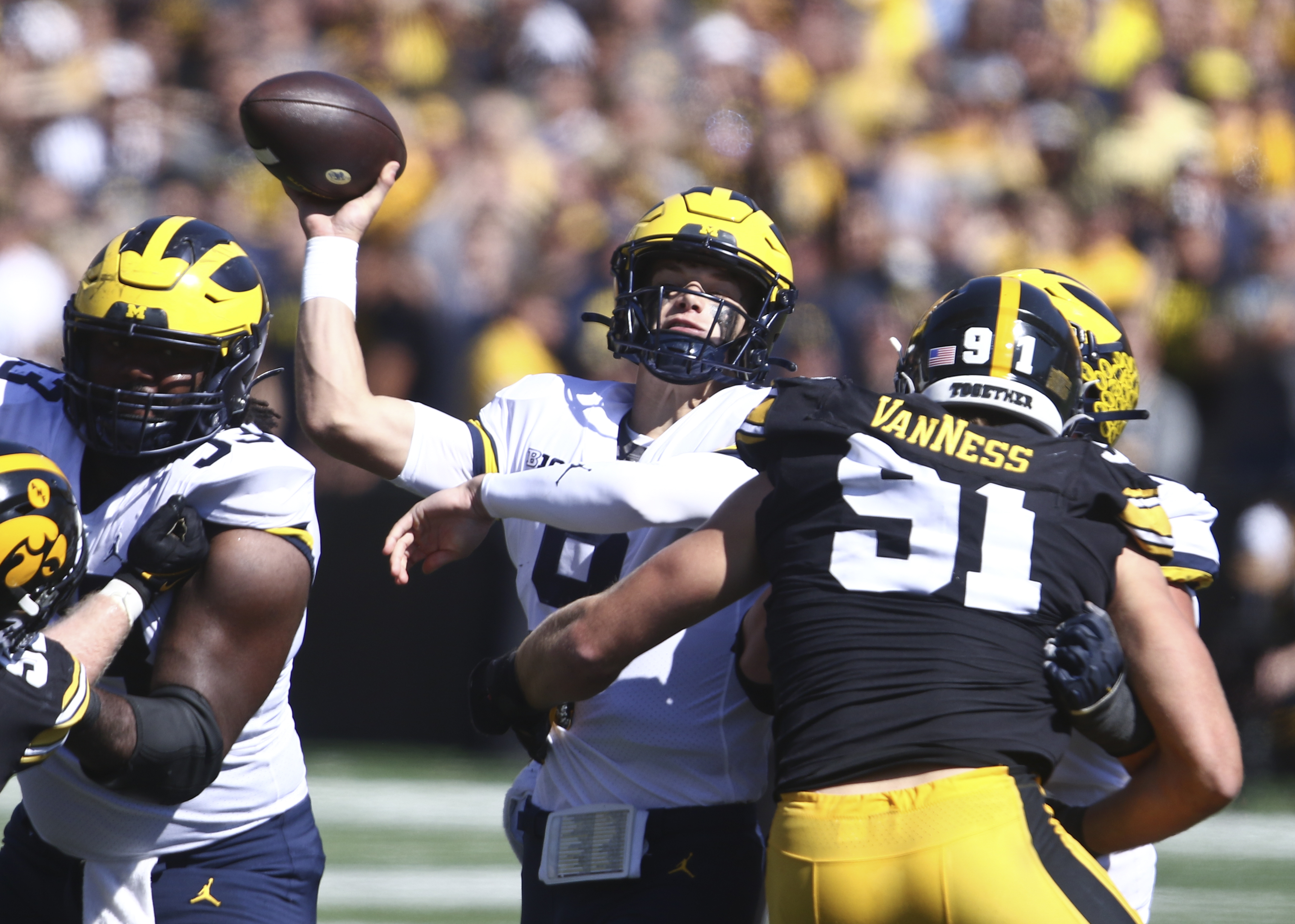 Corum McCarthy lead No. 4 Michigan past Iowa 27 14