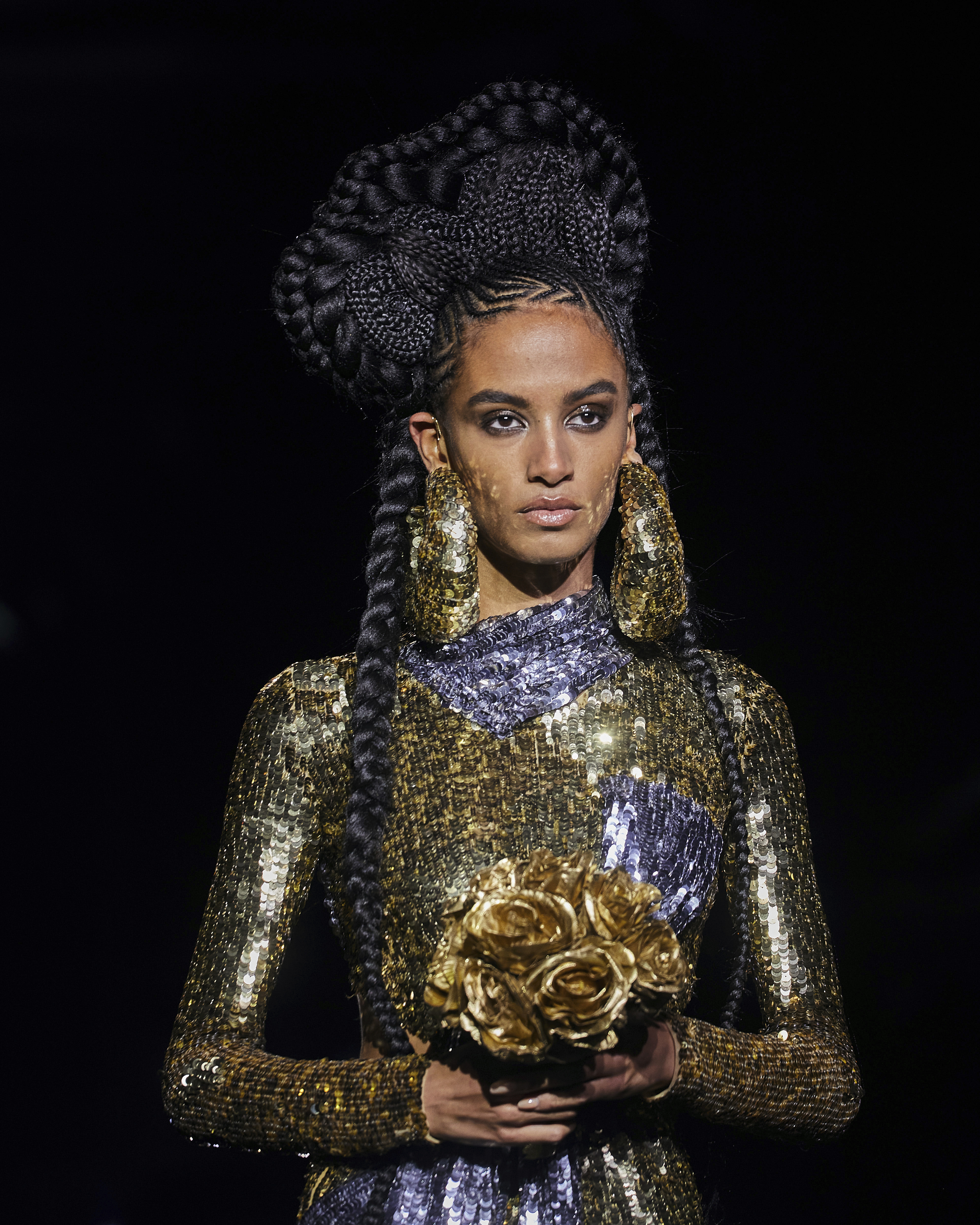 Tom Ford closes Fashion Week with big hair, miles of sparkle - WTOP News
