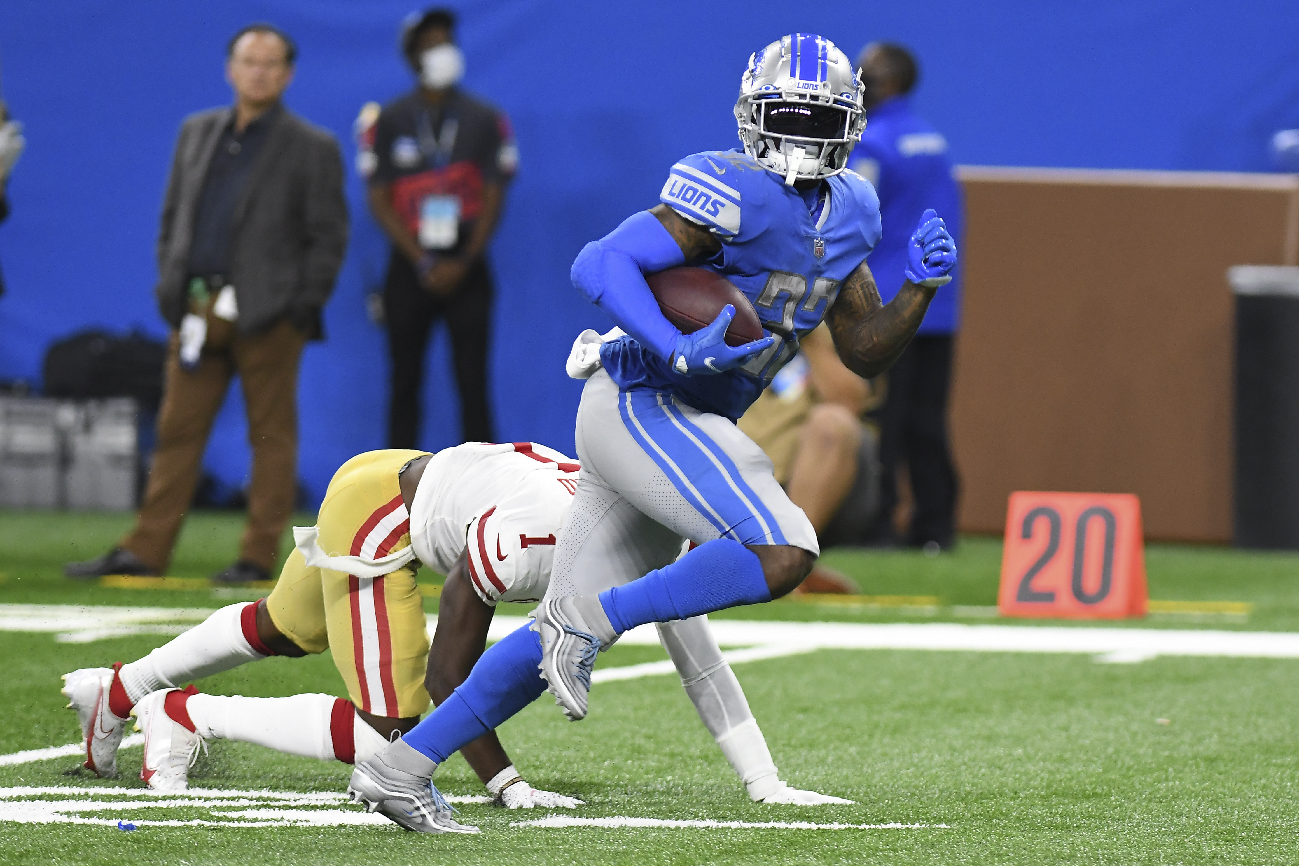 49ers build 28-point lead, hold on for 41-33 win over Lions