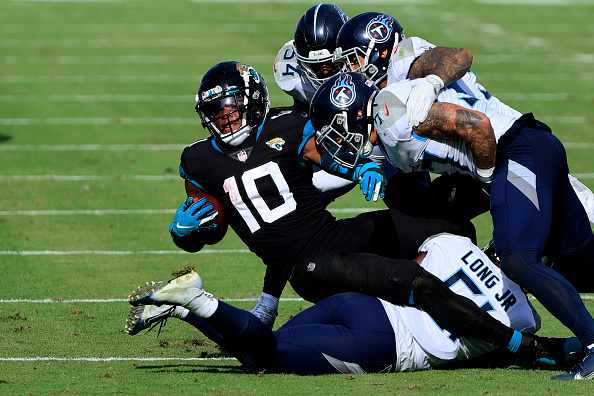 Henry runs for 215 yards, Titans beat Jaguars, 31-10