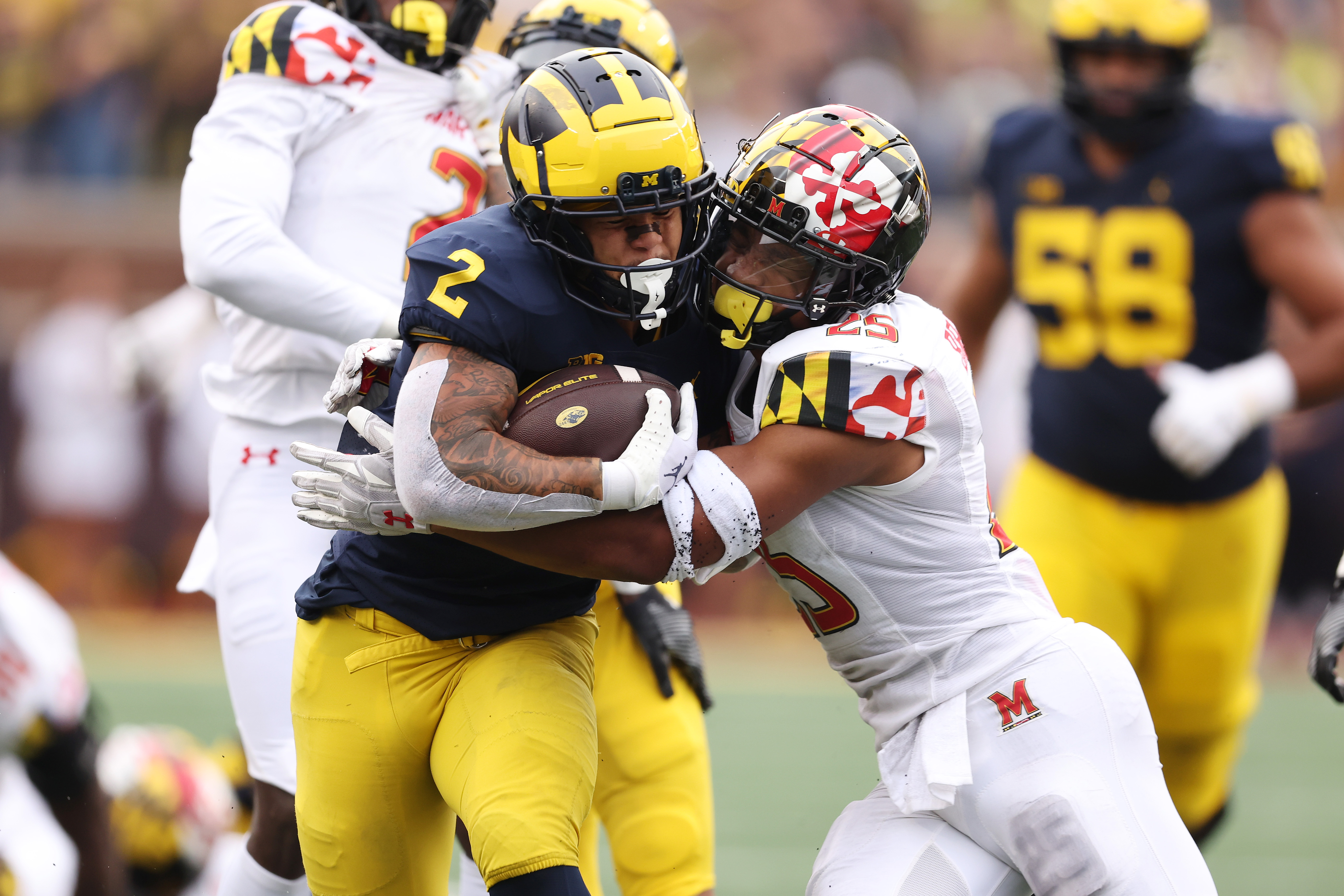 Corum s 243 yards 2 TDs lead No. 4 Michigan past Maryland