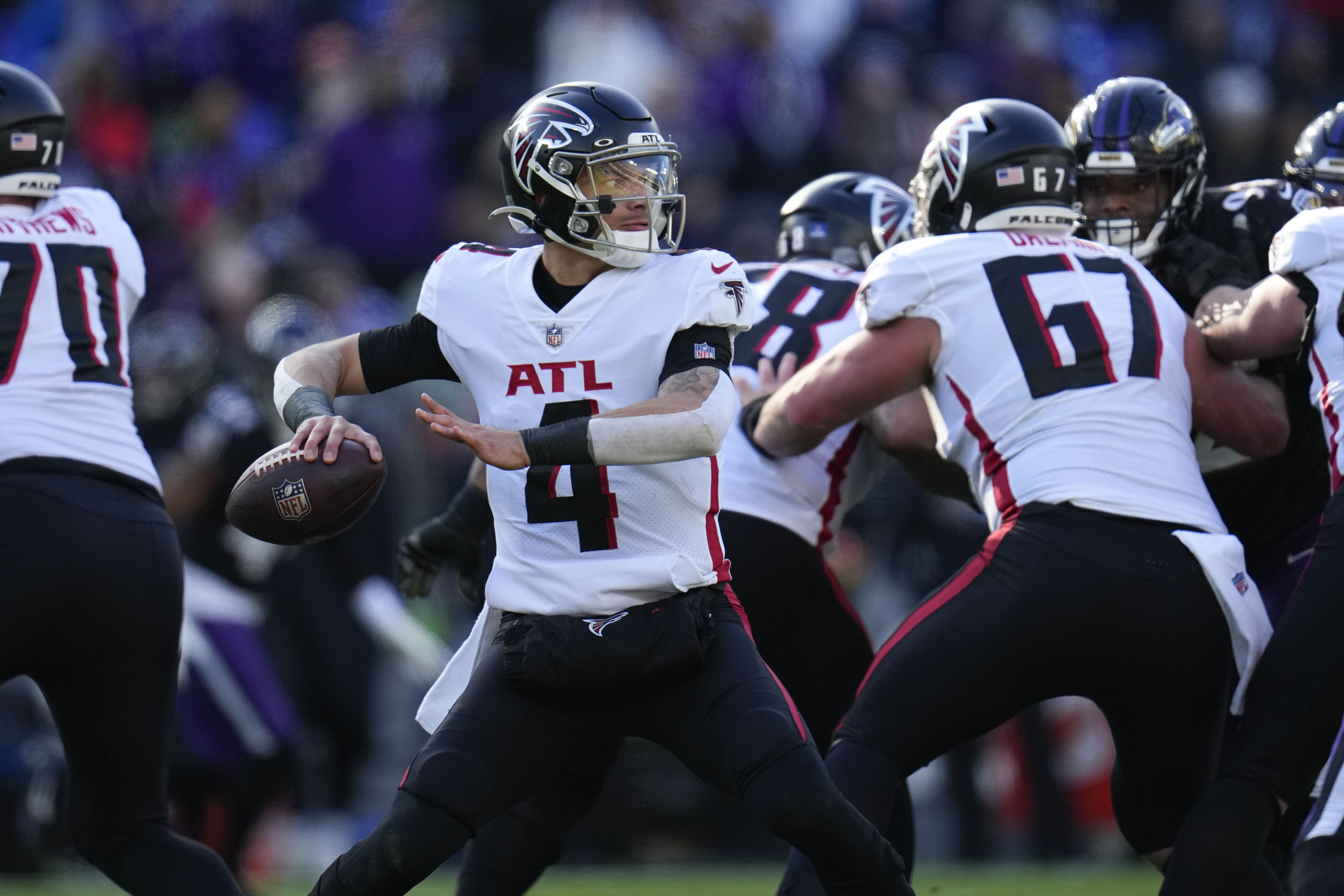 Ravens beat Falcons, 17-9, clinch playoff berth