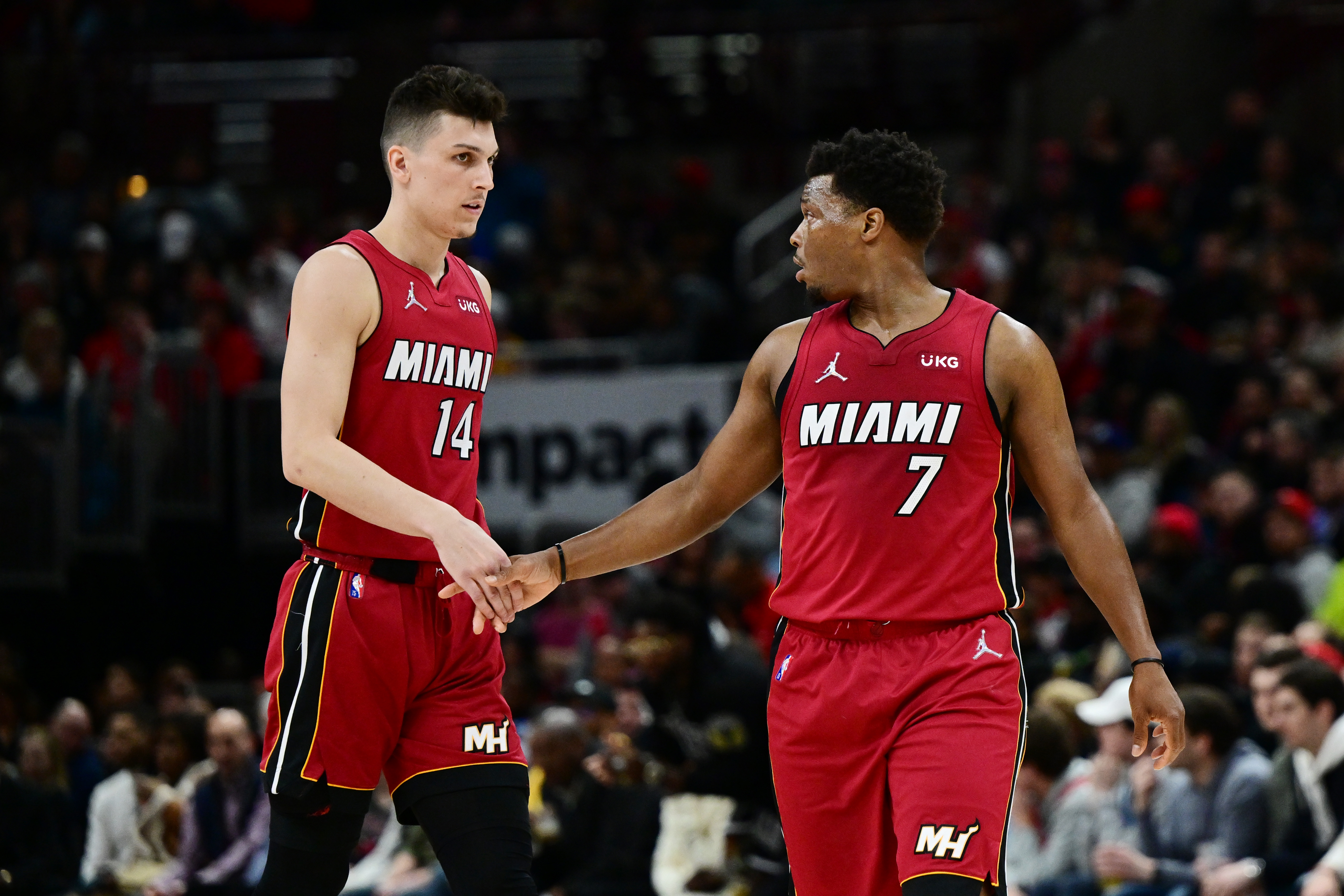 Jimmy Butler and Tyler Herro of the Miami Heat confer against the News  Photo - Getty Images