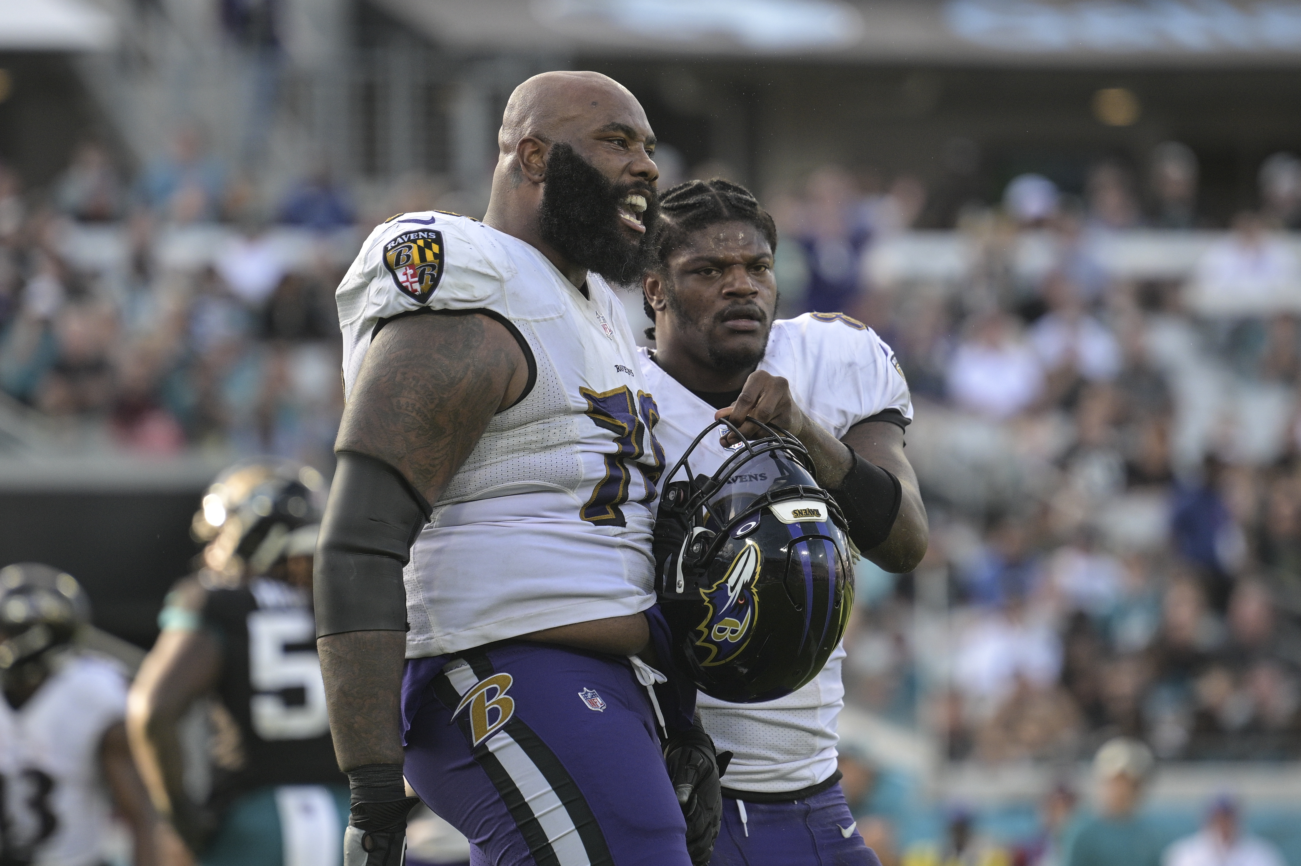 Jacksonville Jaguars safety Andre Cisco (5) breaks up a pass intended for  Baltimore Ravens tight end Mark Andrews (89) during the second half of an  NFL football game, Sunday, Nov. 27, 2022