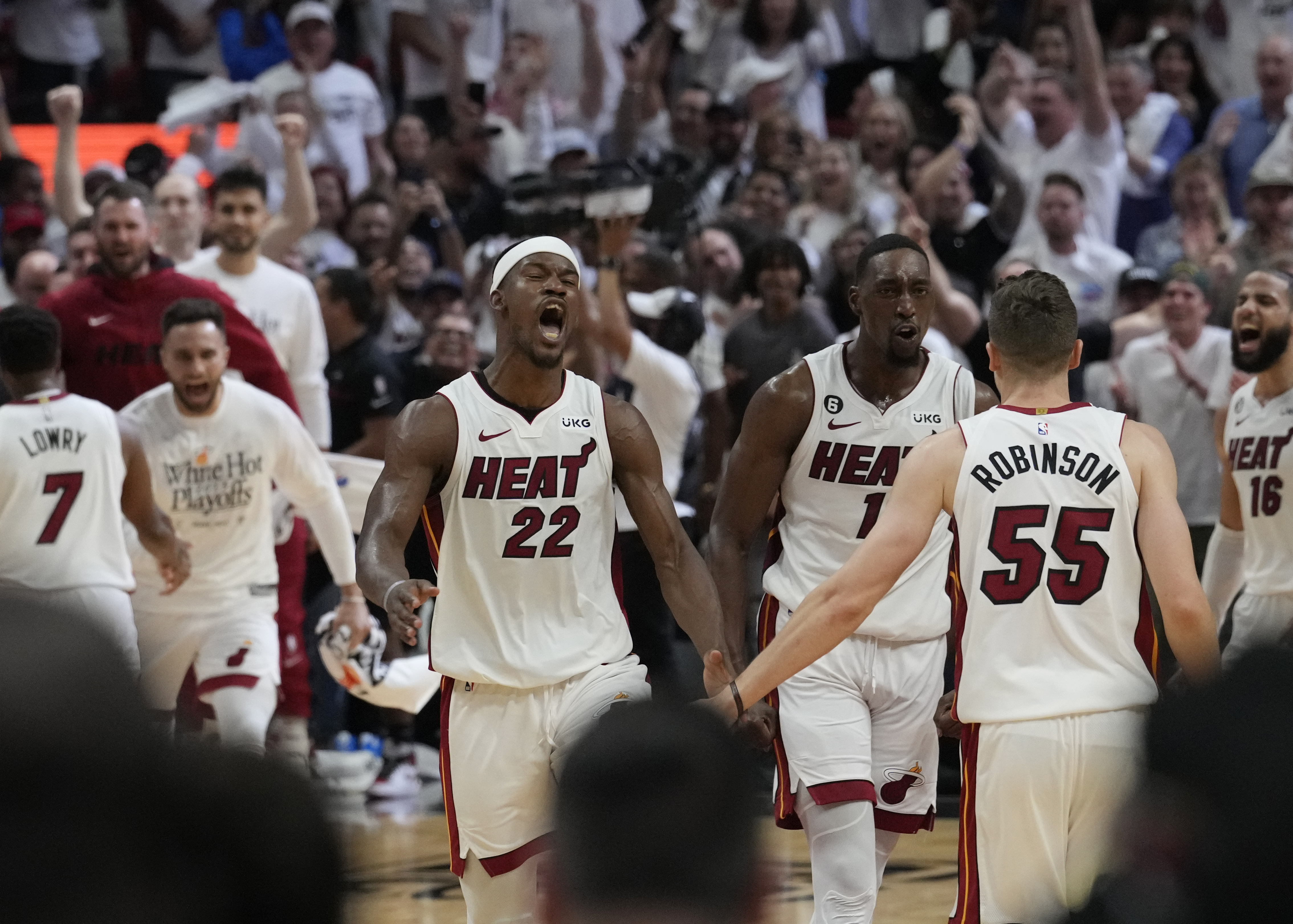 Miami Heat forward Jimmy Butler (22) dribbles the ball against Miami Heat  forward Jimmy Butler (22) during the third quarter in game one of the 2023  NBA Finals at Ball Arena.