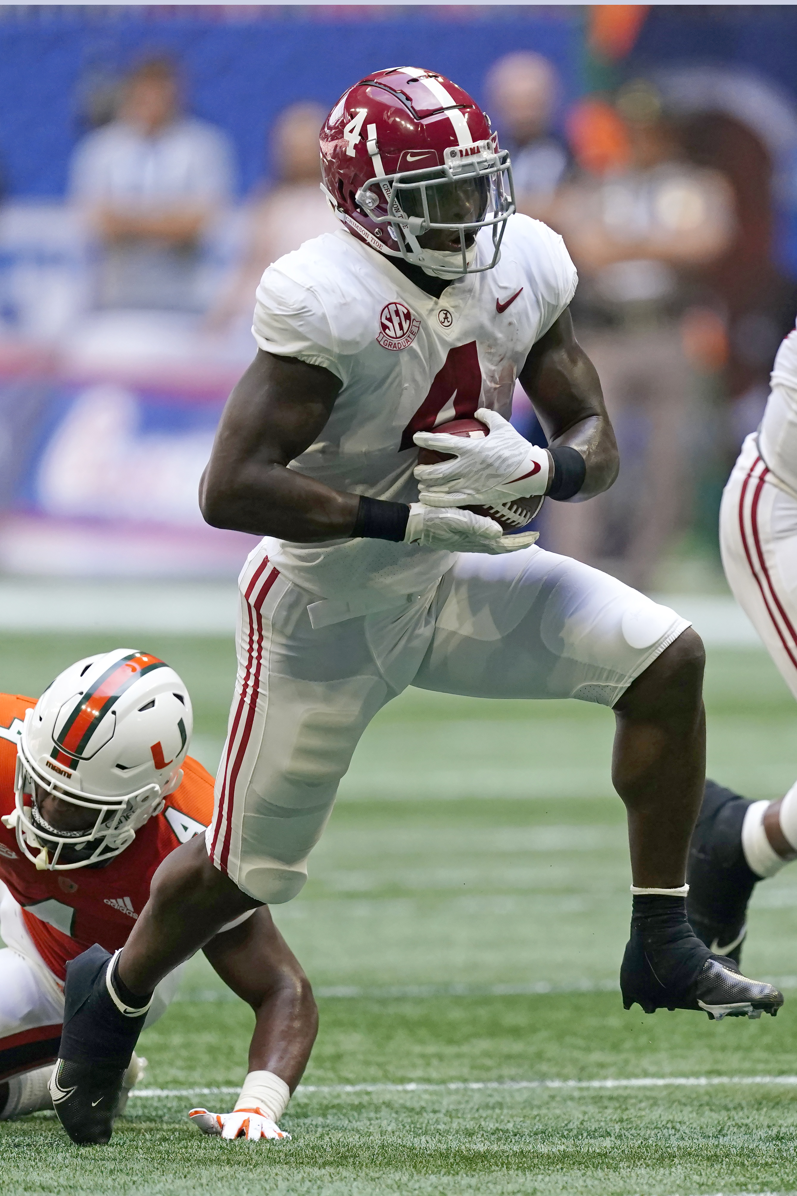 ATLANTA, GA – SEPTEMBER 04: Alabama's Evan Neal (73) places a leather  helmet on head coach Nick Saban following the conclusion of the Chick-fil-A  Kick-Off Game between the Miami Hurricanes and the