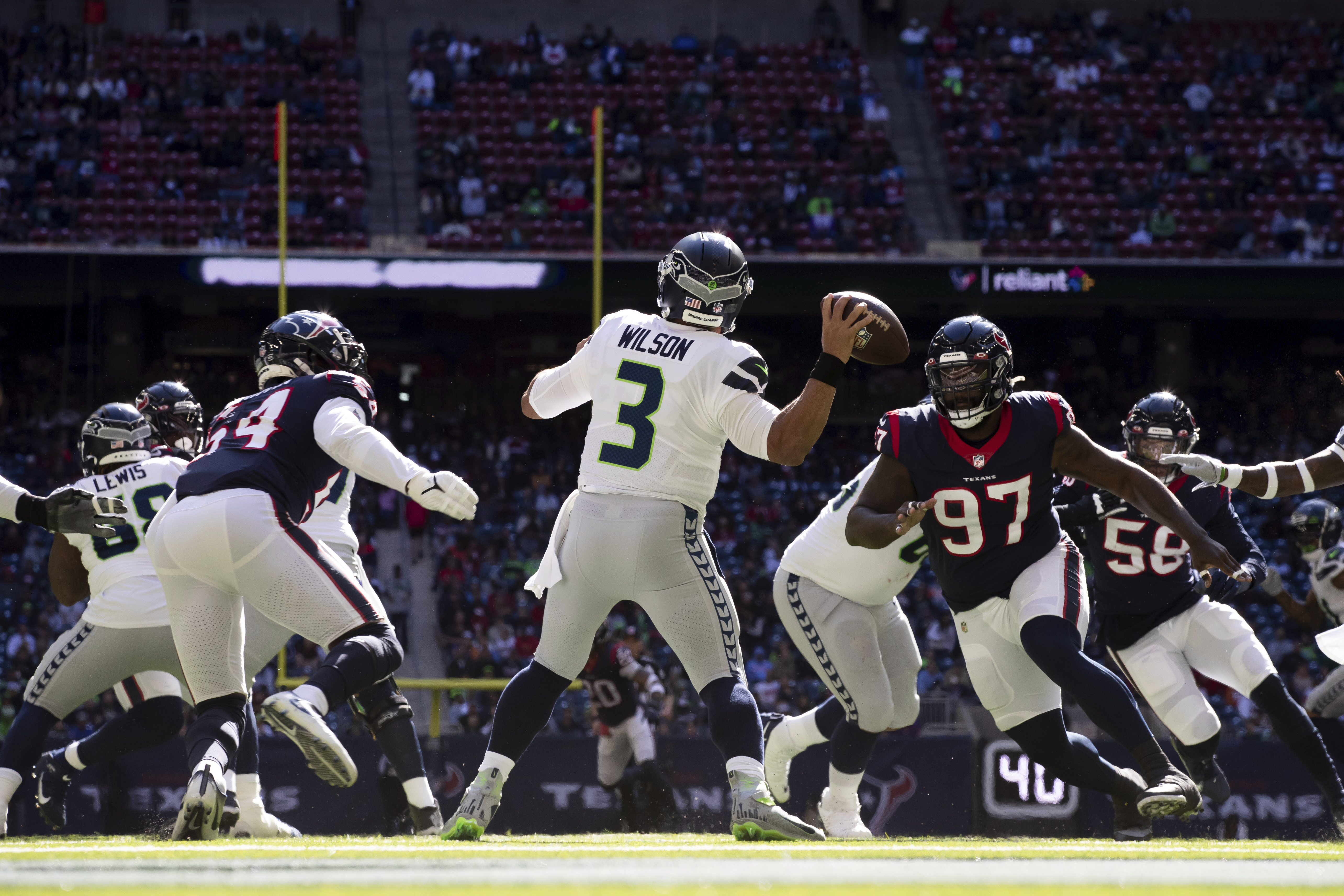 Wilson has 2 TD passes as Seahawks beat Texans 33-13