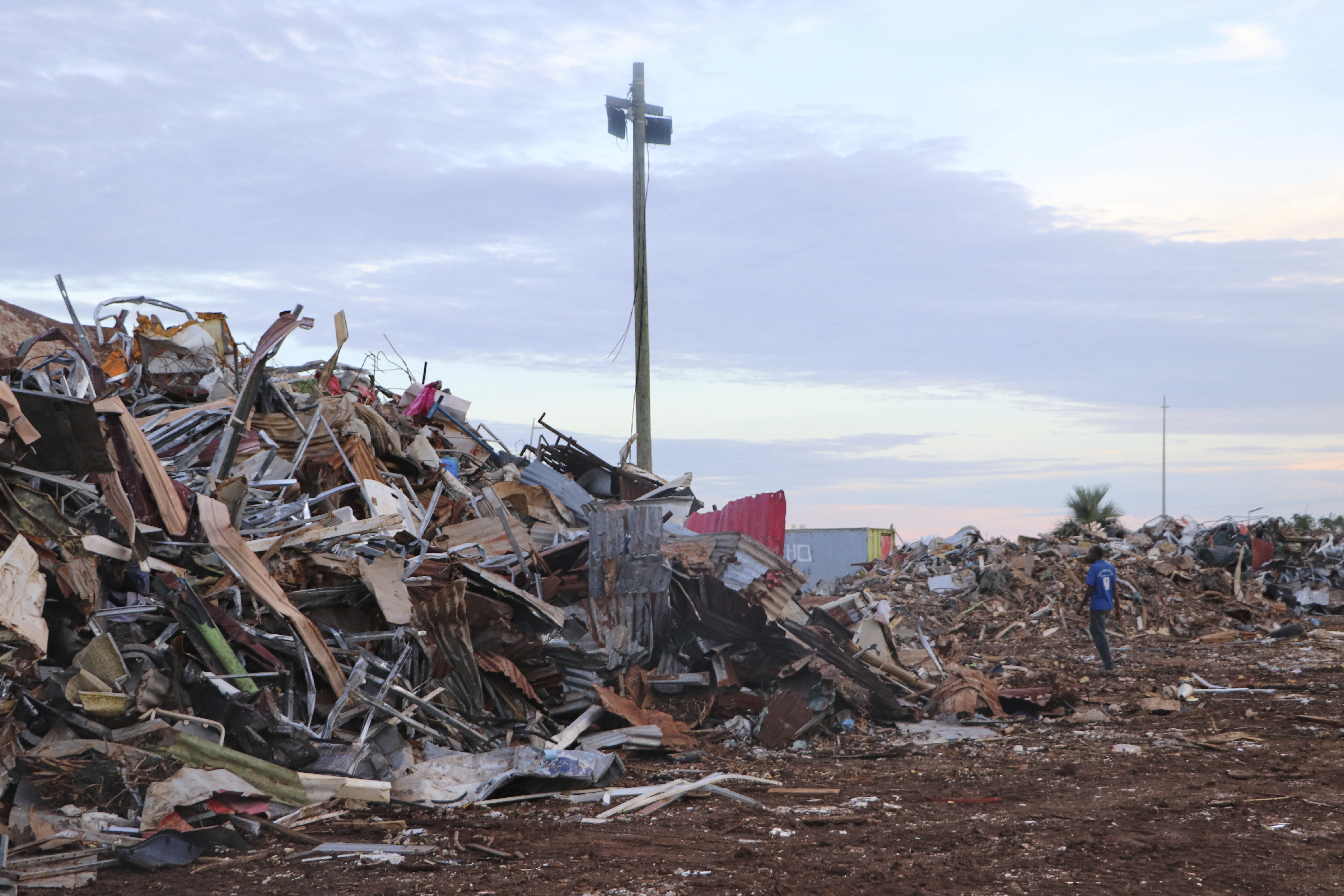 French President Macron brought new promises to cyclone-battered