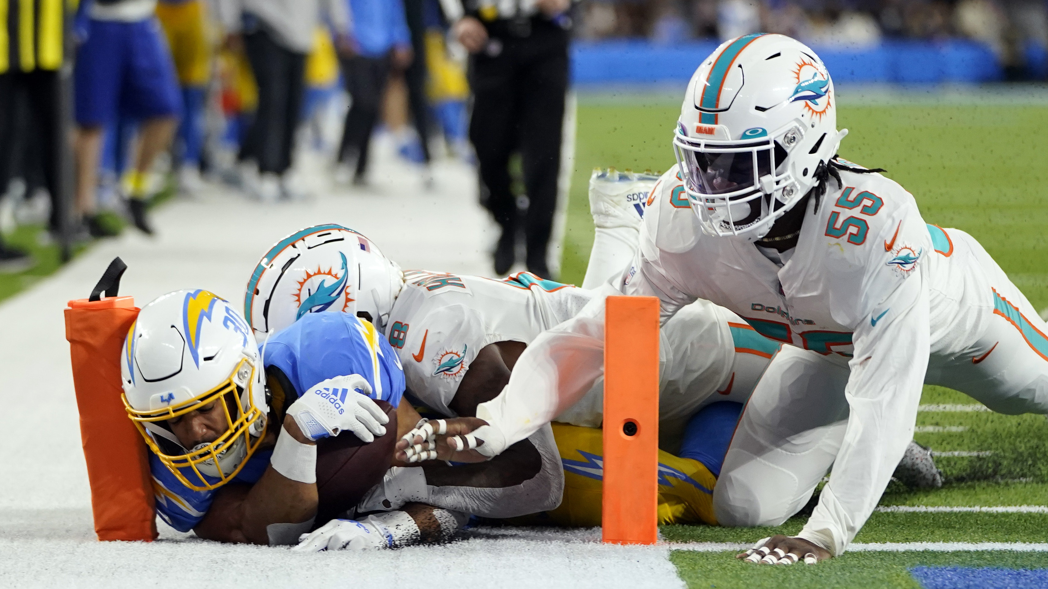 Miami Dolphins defensive tackle Zach Sieler (92) walks back to the