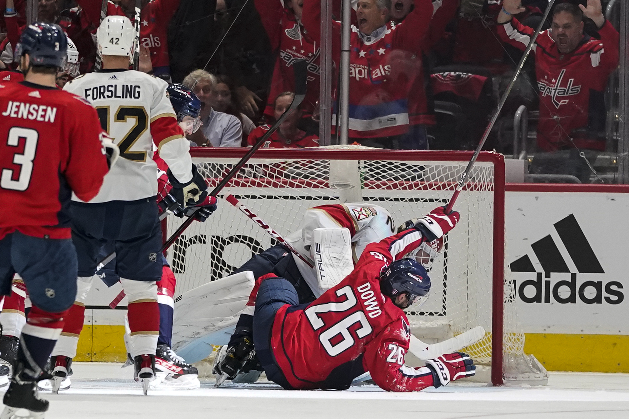 Florida Panthers center Aleksander Barkov (16) and Washington Capitals left  wing Alex Ovechkin (8) react after Game 6 in the first round of the NHL  Stanley Cup hockey playoffs, Friday, May 13