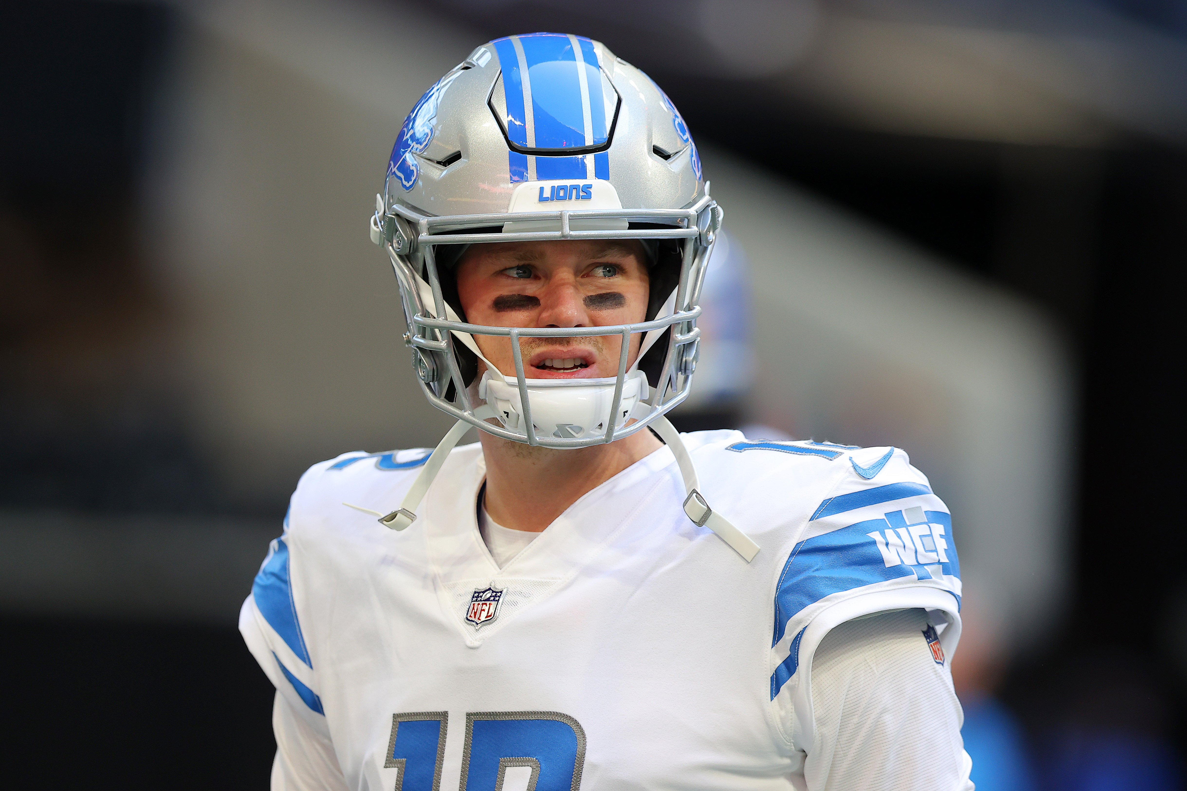 Detroit Lions quarterback Tim Boyle (12) plays against the