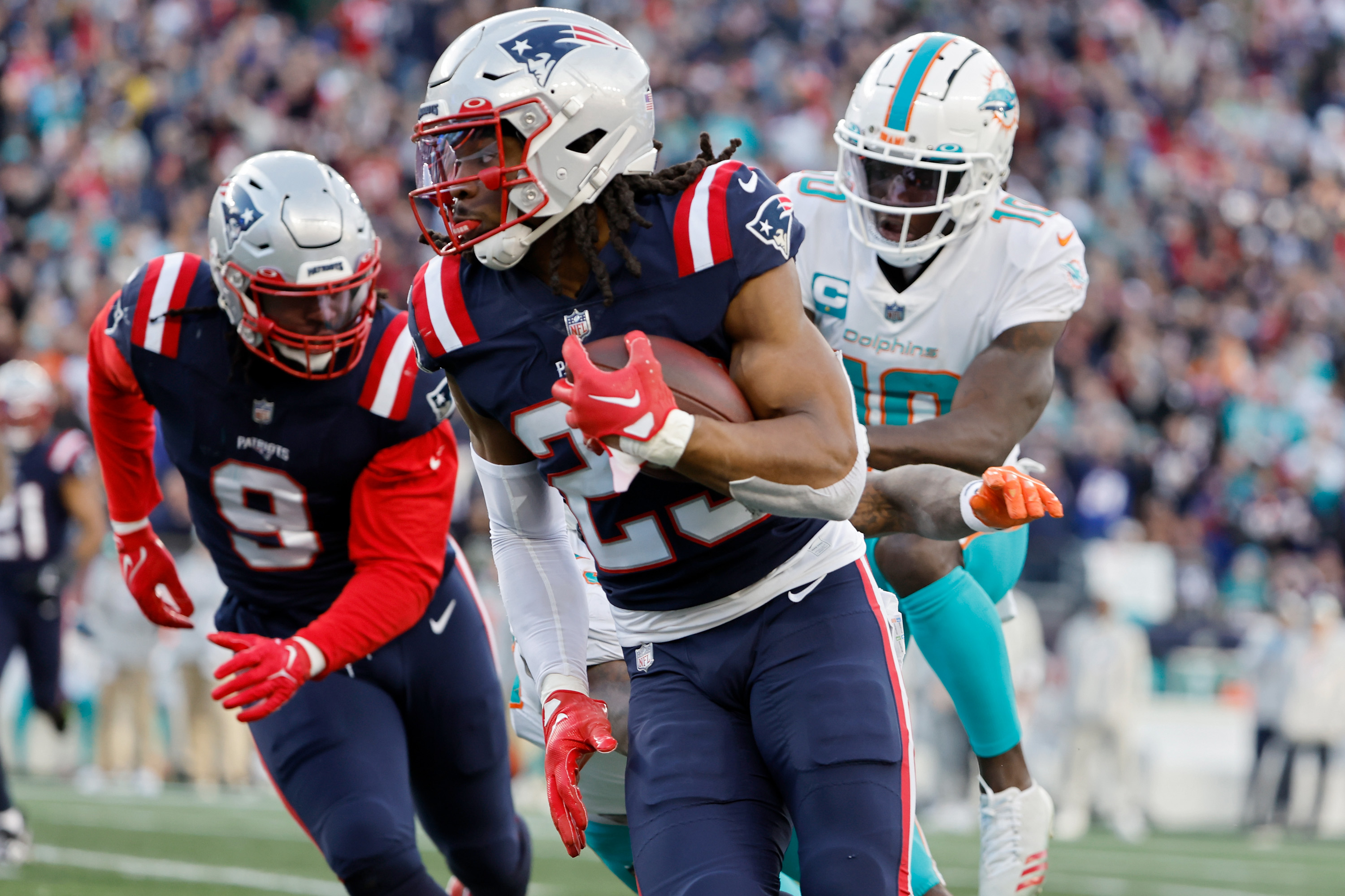 Dugger INT return helps lift Patriots over fading Dolphins 23-21
