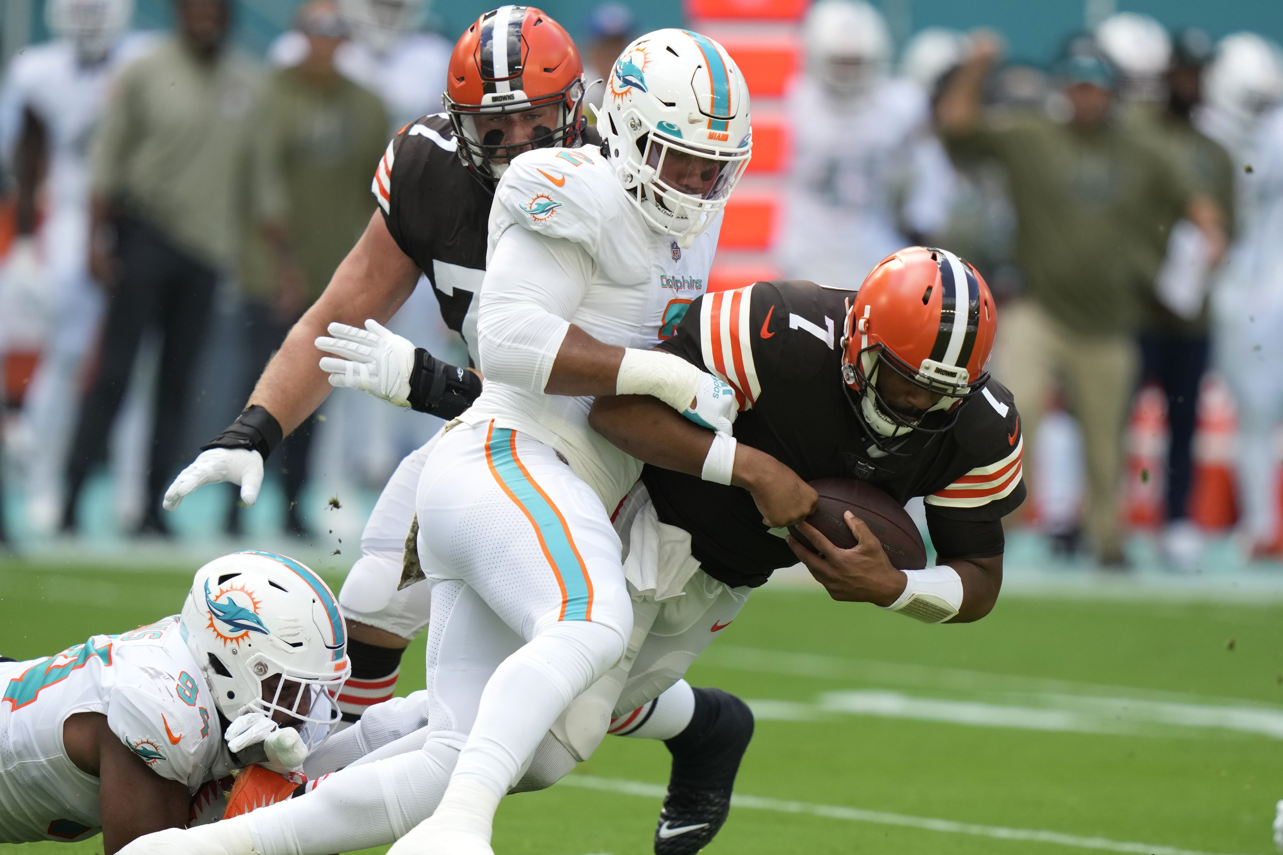 CBS Sports sideline reporter AJ Ross interviews Miami Dolphins quarterback  Tua Tagovailoa (1) on the field after the Dolphins defeated the Cleveland  Browns during an NFL football game, Sunday, Nov. 13, 2022