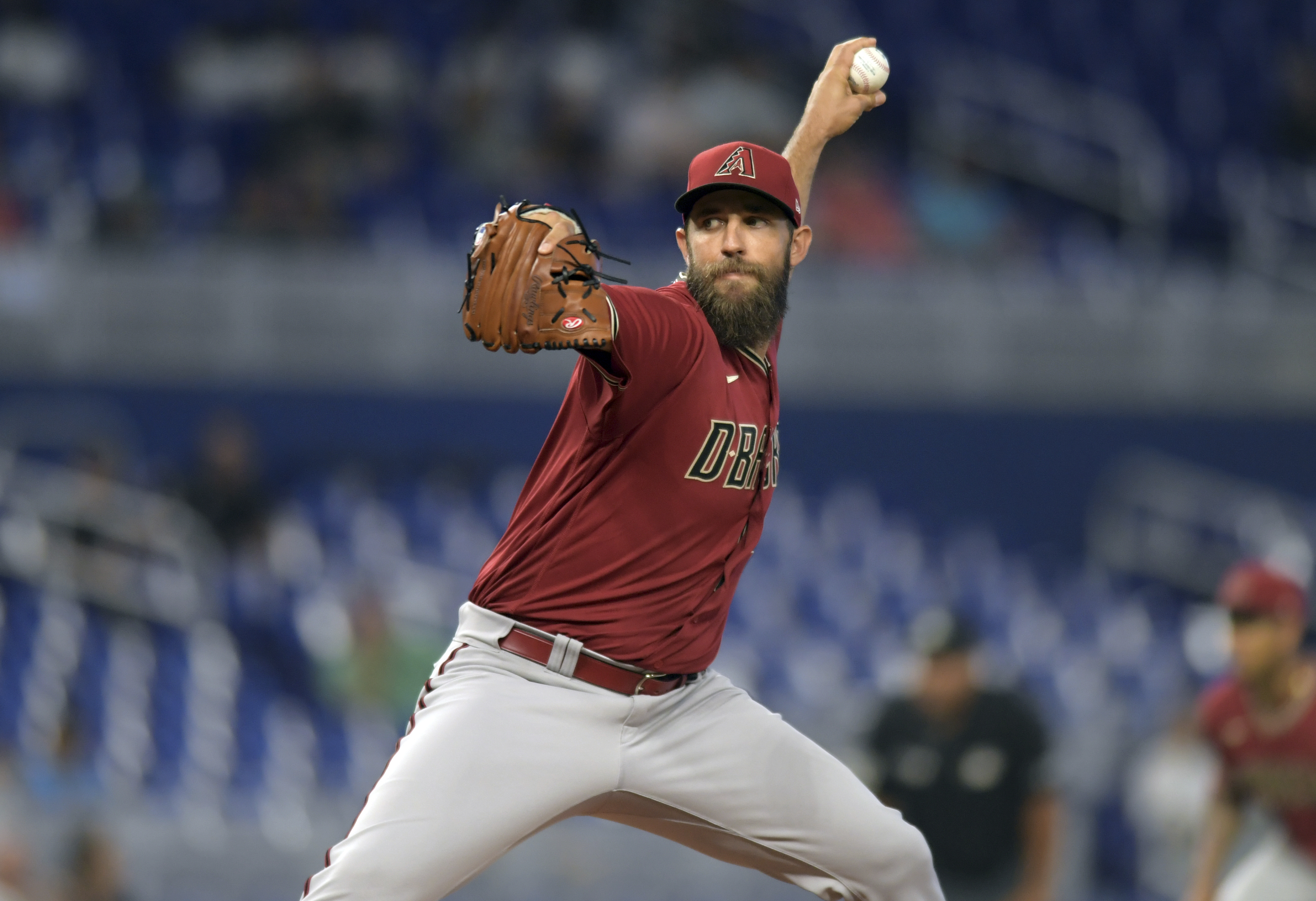 Arizona's Madison Bumgarner held back by teammates after first-inning  ejection, Arizona Diamondbacks