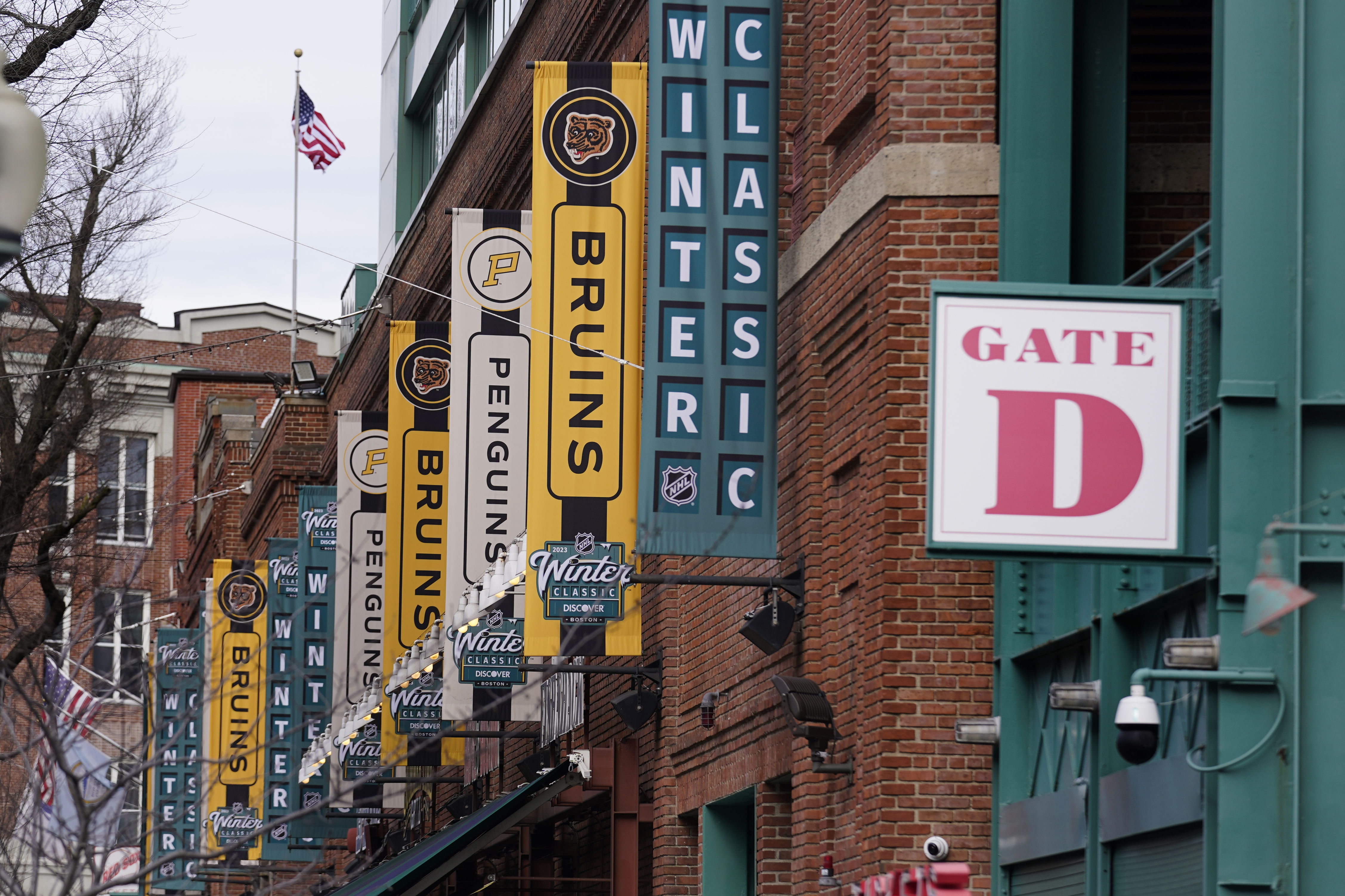 Bruins players wear vintage Red Sox uniforms before Winter Classic