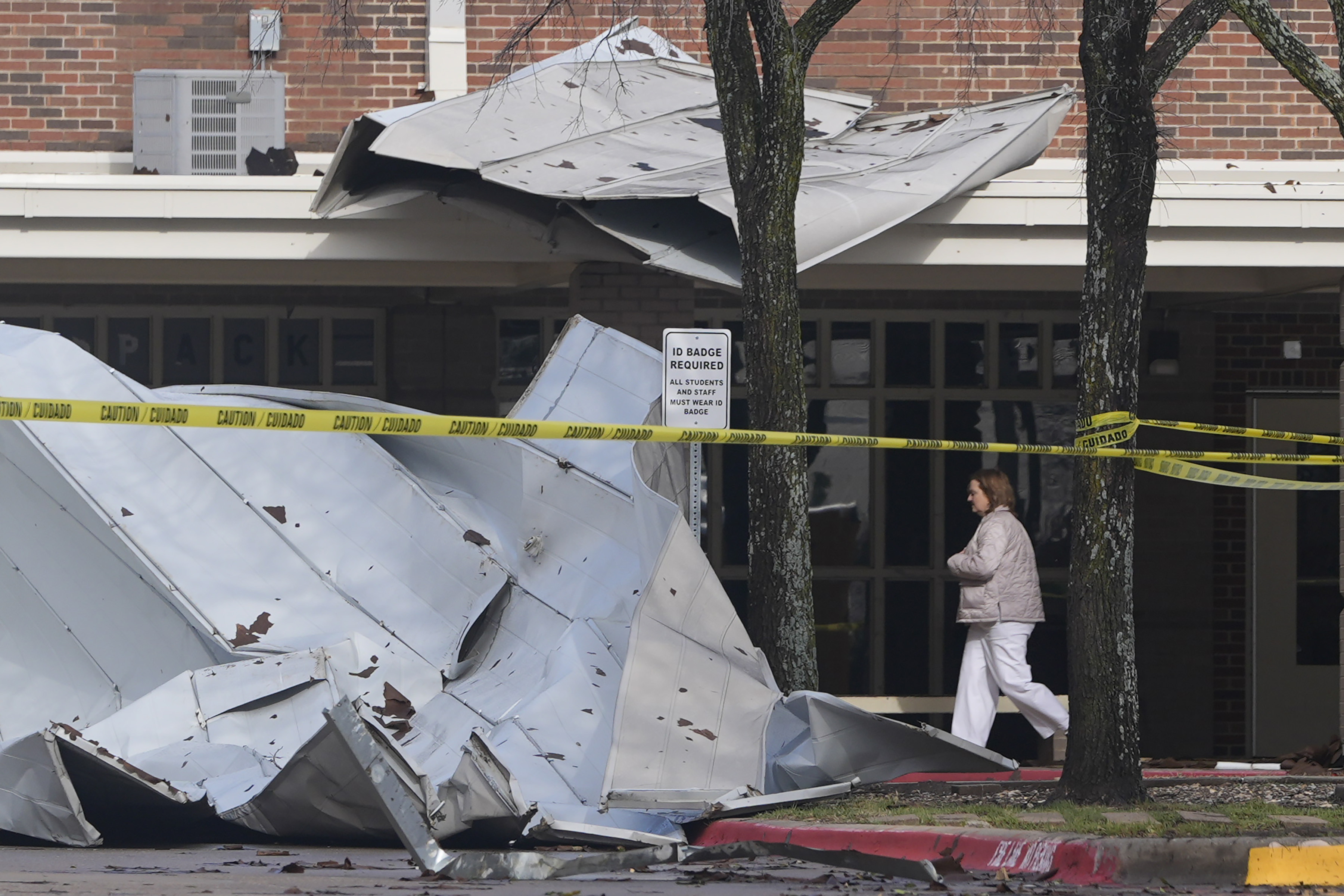 Powerful US storms kill 2 and bring threats from critical fire