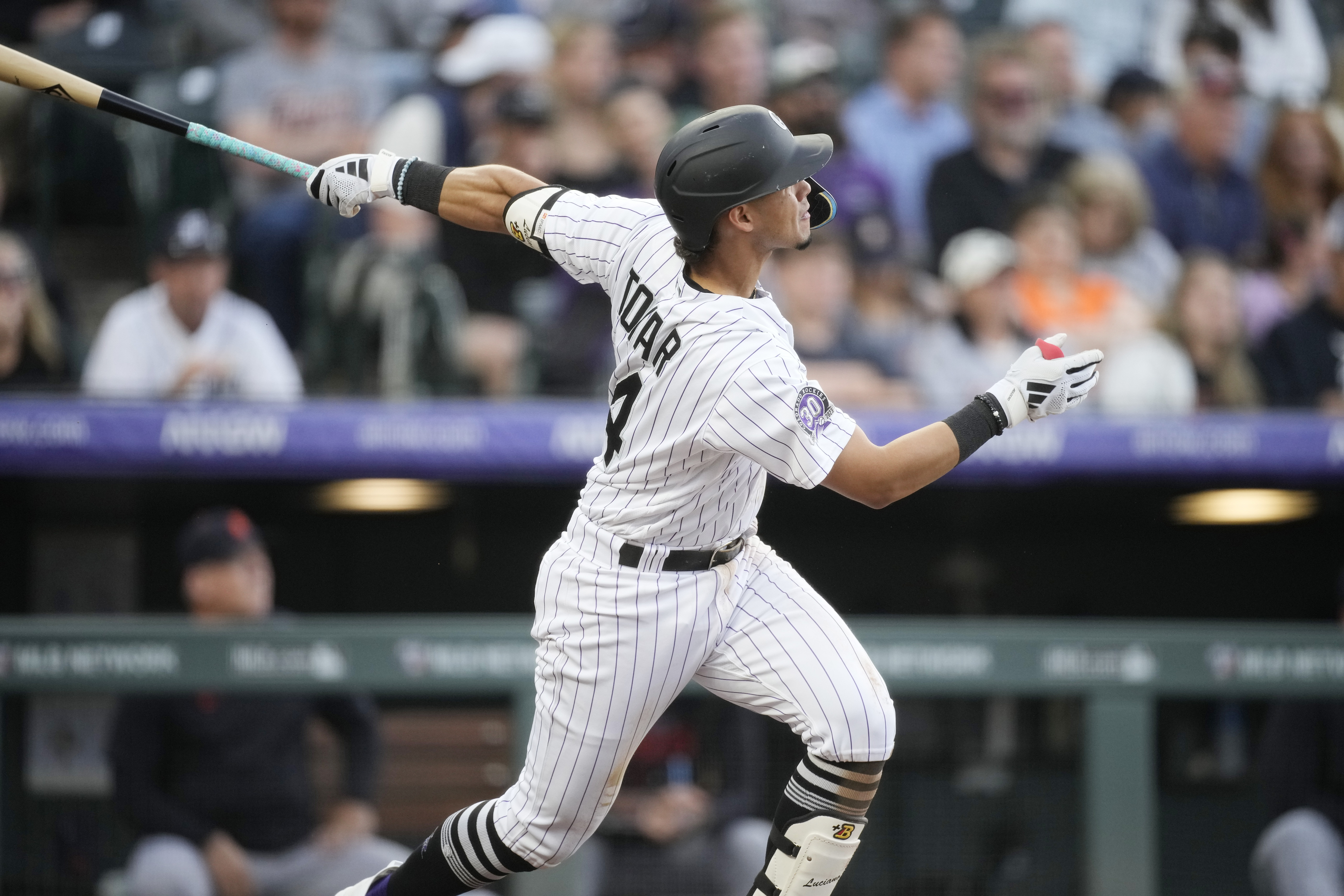 Jorge Alfaro of the Colorado Rockies hits a fourth inning double in a  News Photo - Getty Images
