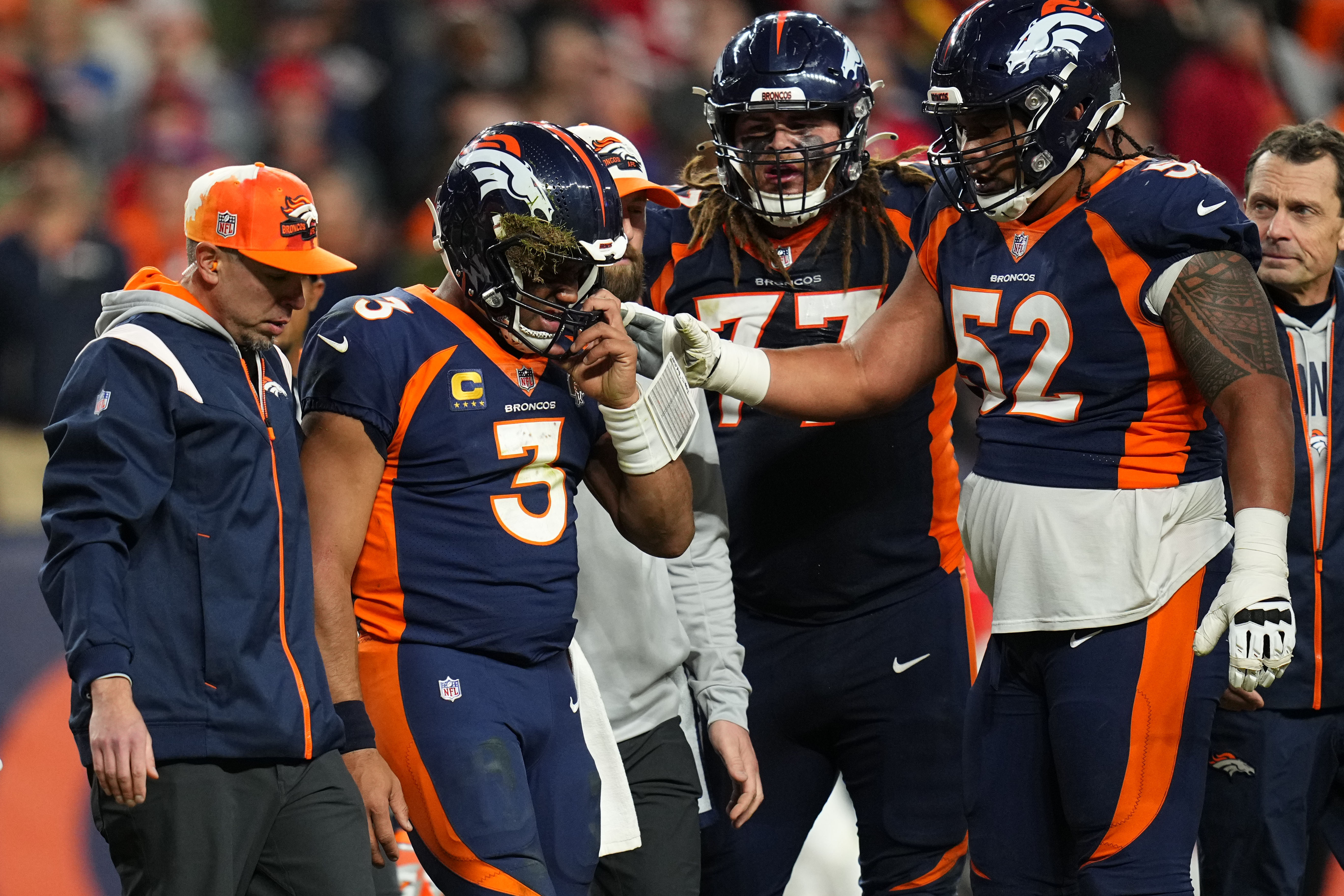 Wilson's concussion latest setback in Broncos' awful year