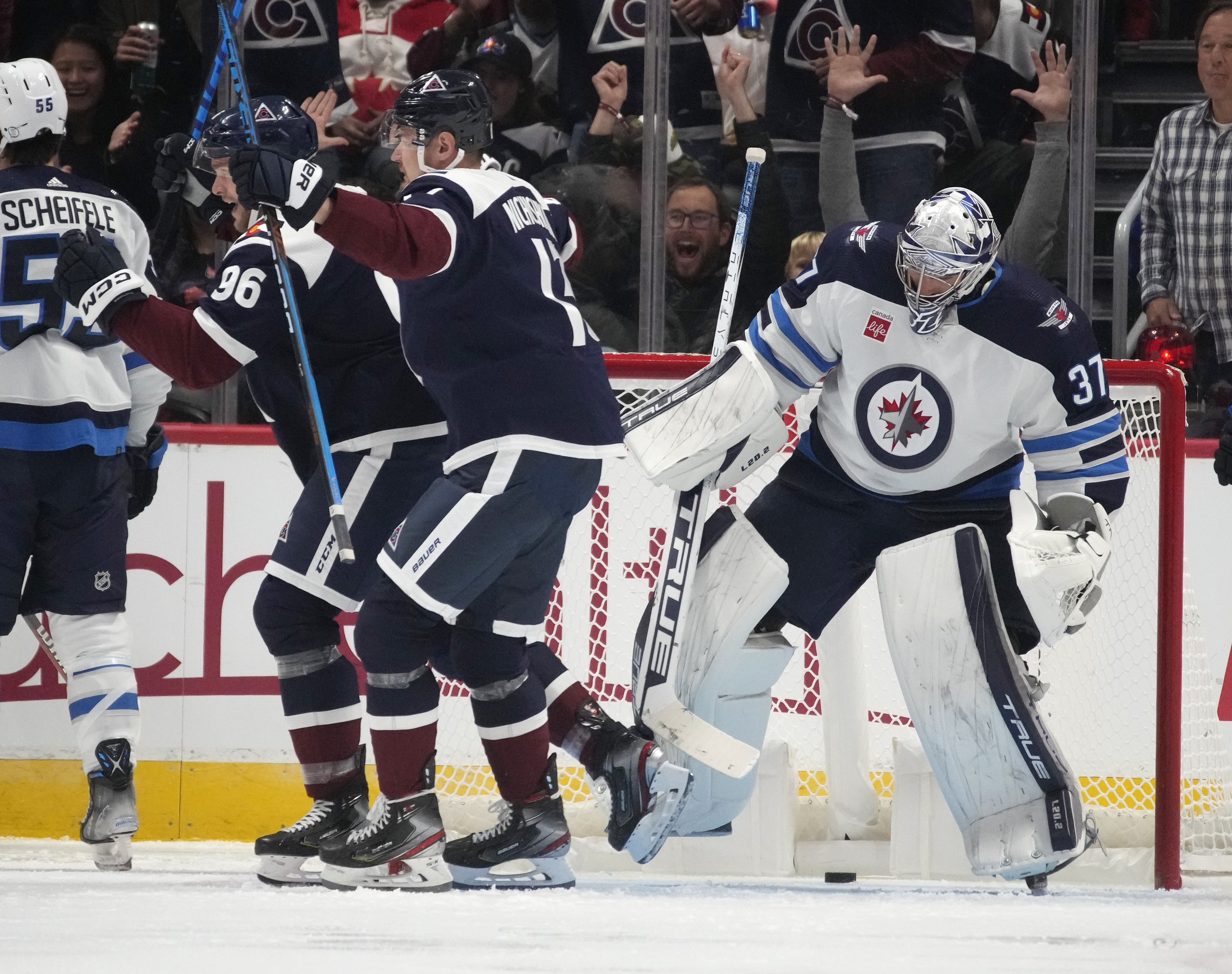 Pionk scores second goal of game in OT, Jets beat Avalanche 4-3 - The Globe  and Mail