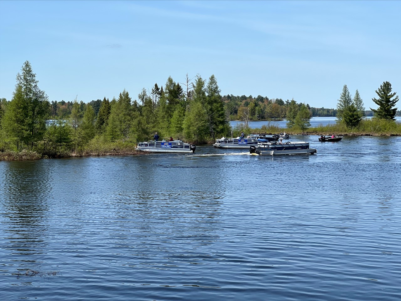 Floating island Wisconsin community members use personal boats to